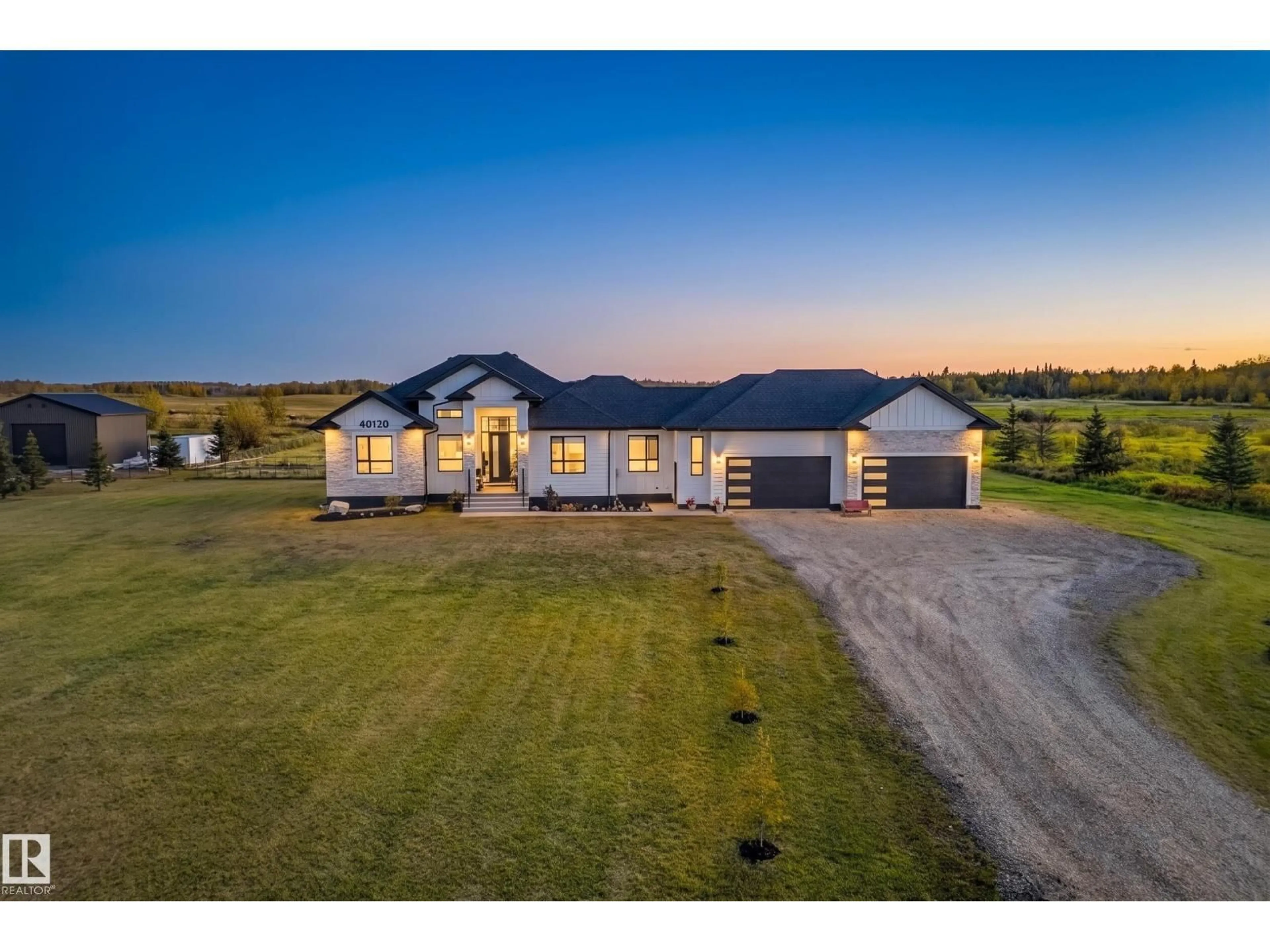 A pic from outside/outdoor area/front of a property/back of a property/a pic from drone, building for 70 50509 RGE RD 222, Rural Leduc County Alberta T0B3M2