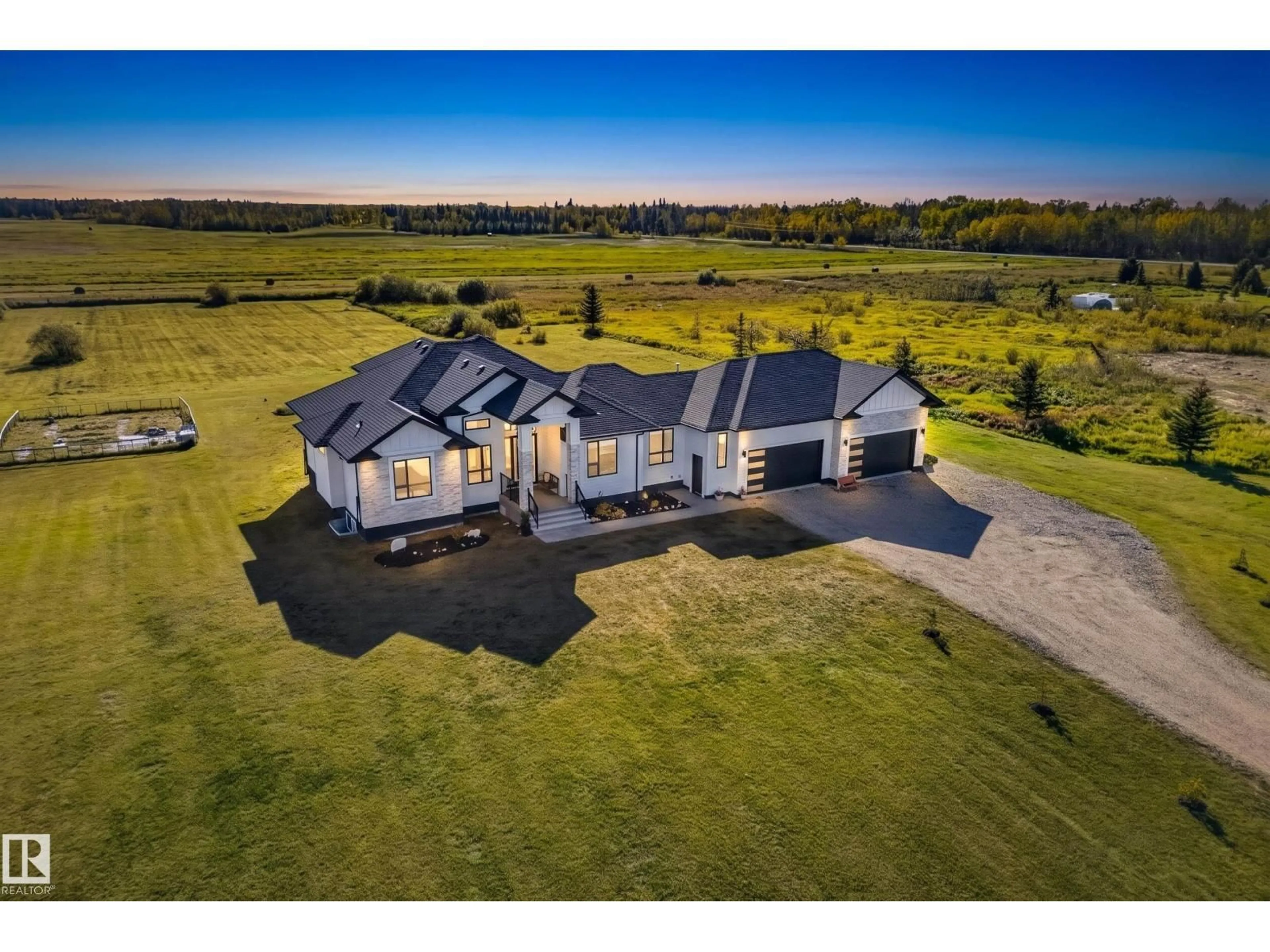 A pic from outside/outdoor area/front of a property/back of a property/a pic from drone, unknown for 70 50509 RGE RD 222, Rural Leduc County Alberta T0B3M2