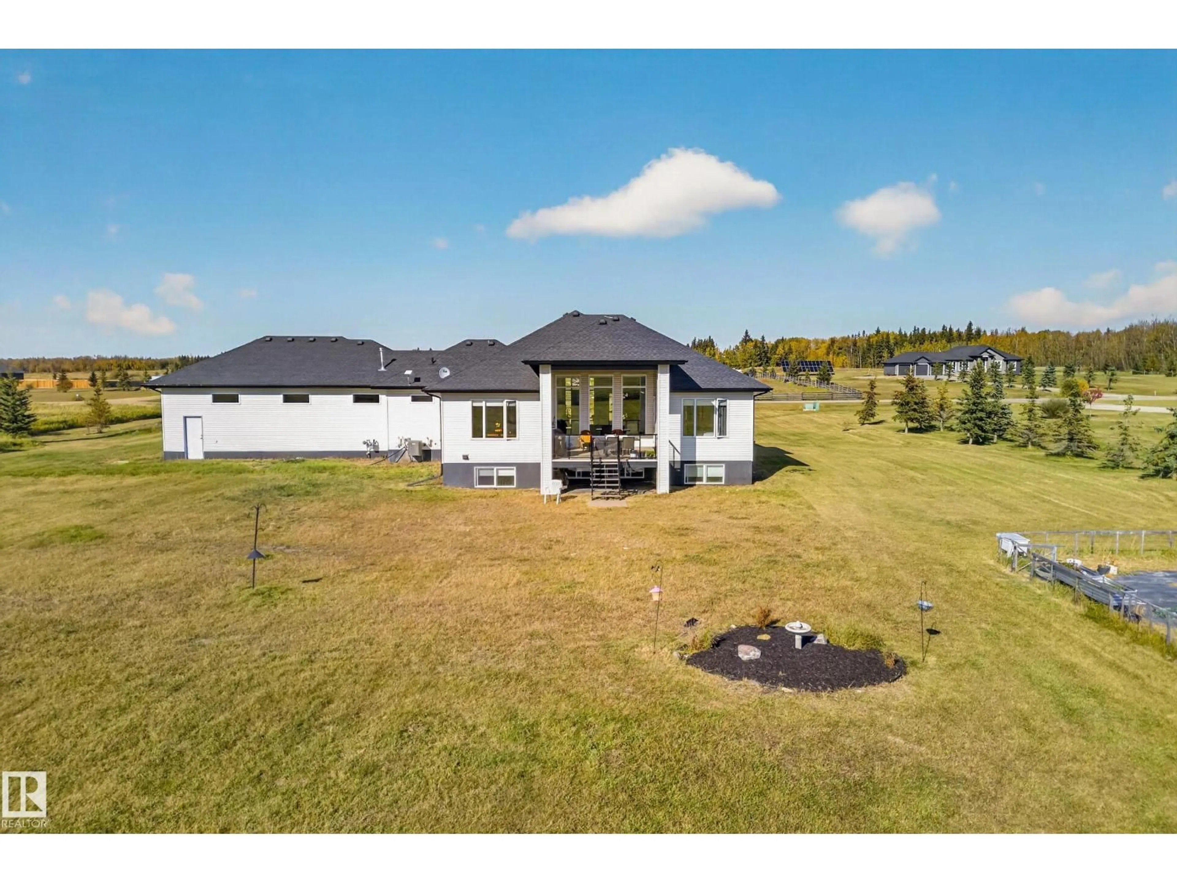 A pic from outside/outdoor area/front of a property/back of a property/a pic from drone, unknown for 70 50509 RGE RD 222, Rural Leduc County Alberta T0B3M2
