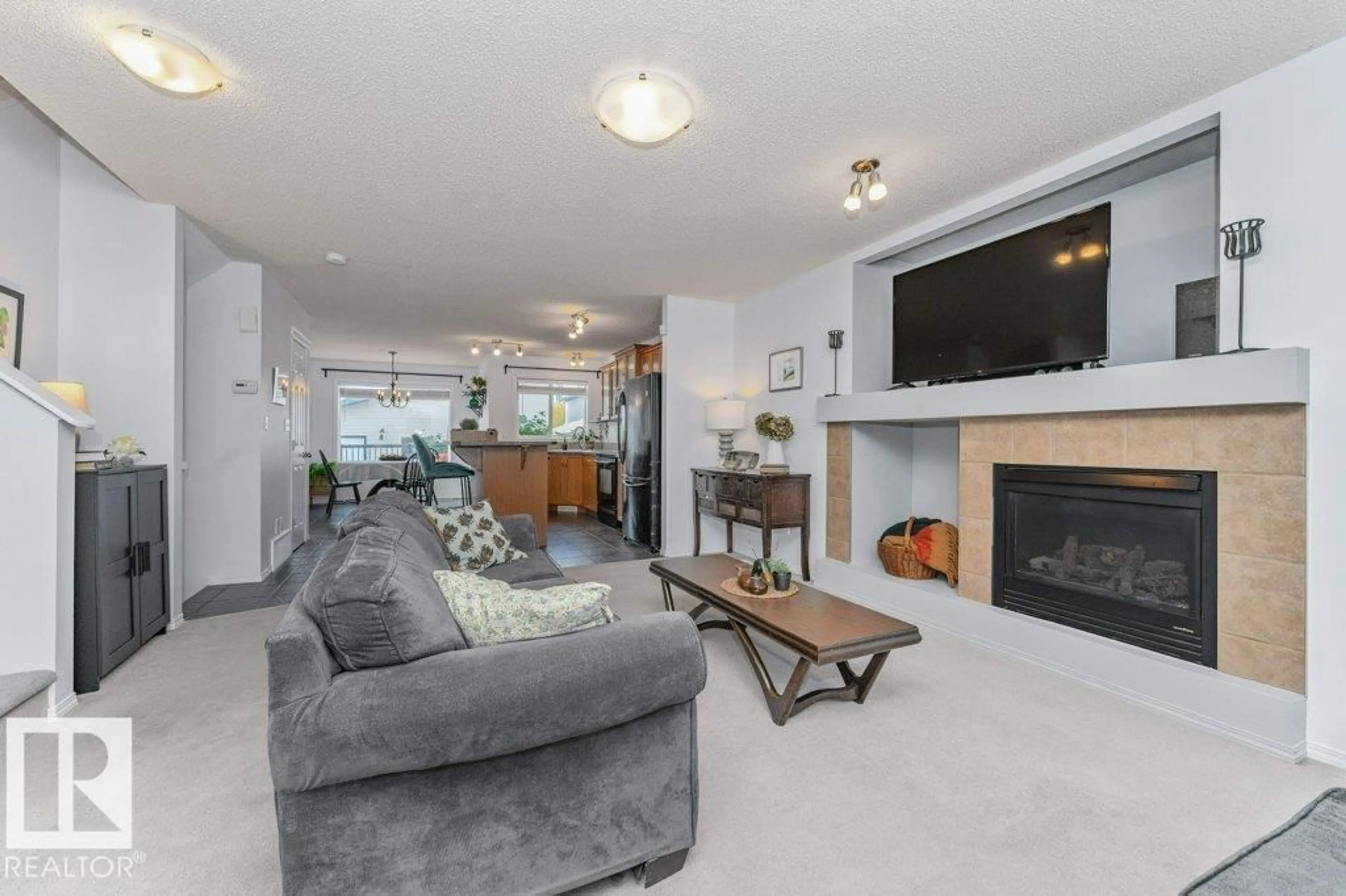 Living room with furniture, unknown for SW - 12059 19 AV, Edmonton Alberta T6W1W5
