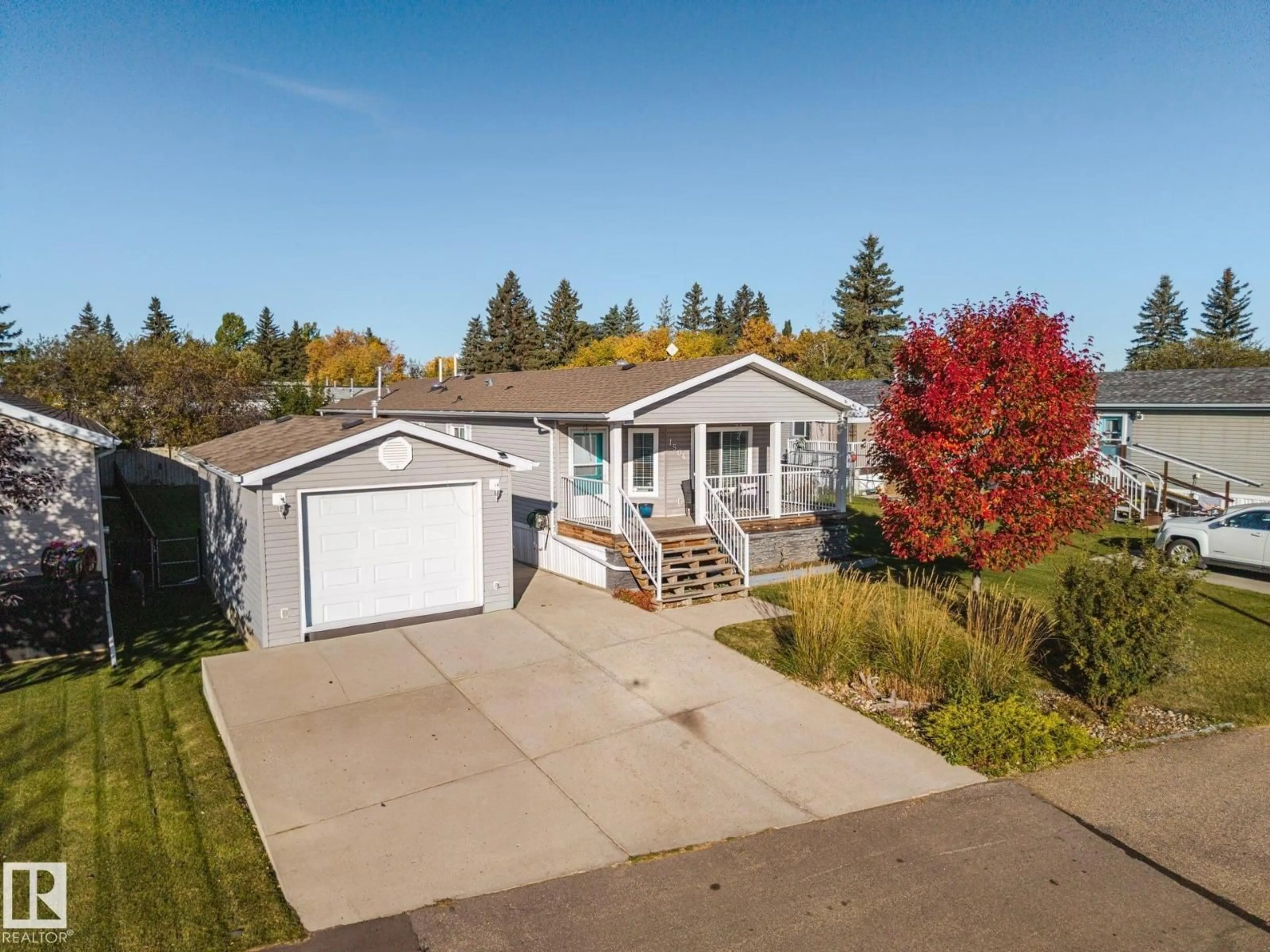 A pic from outside/outdoor area/front of a property/back of a property/a pic from drone, street for 1504 RANGE ROAD 272 ROAD, Rural Parkland County Alberta T7X4M4
