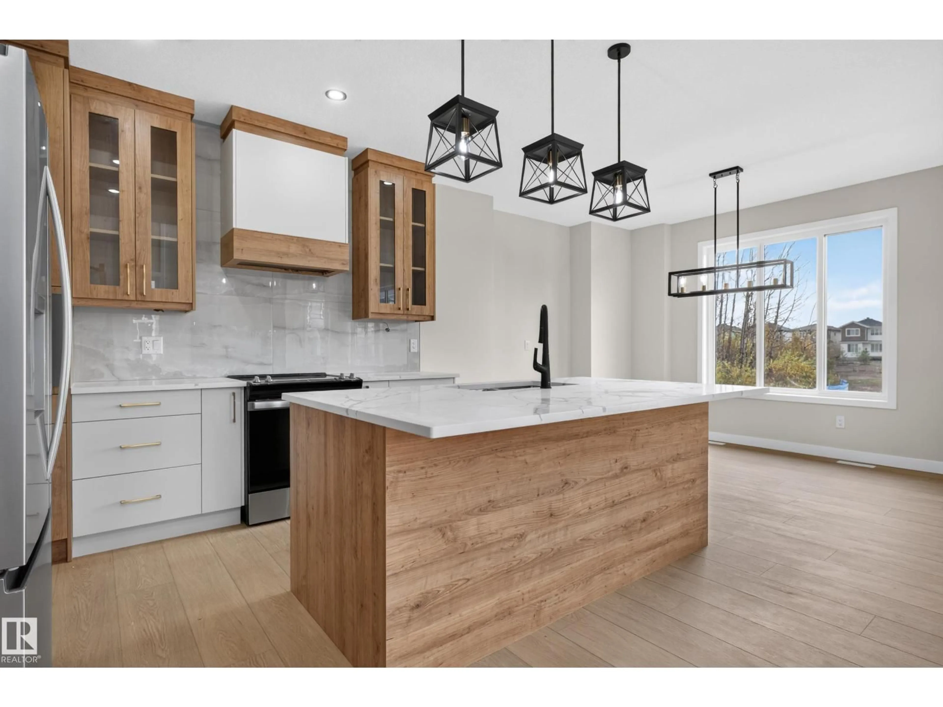 Open concept kitchen, unknown for 2 PEBBLE CV, Spruce Grove Alberta T7X4E7