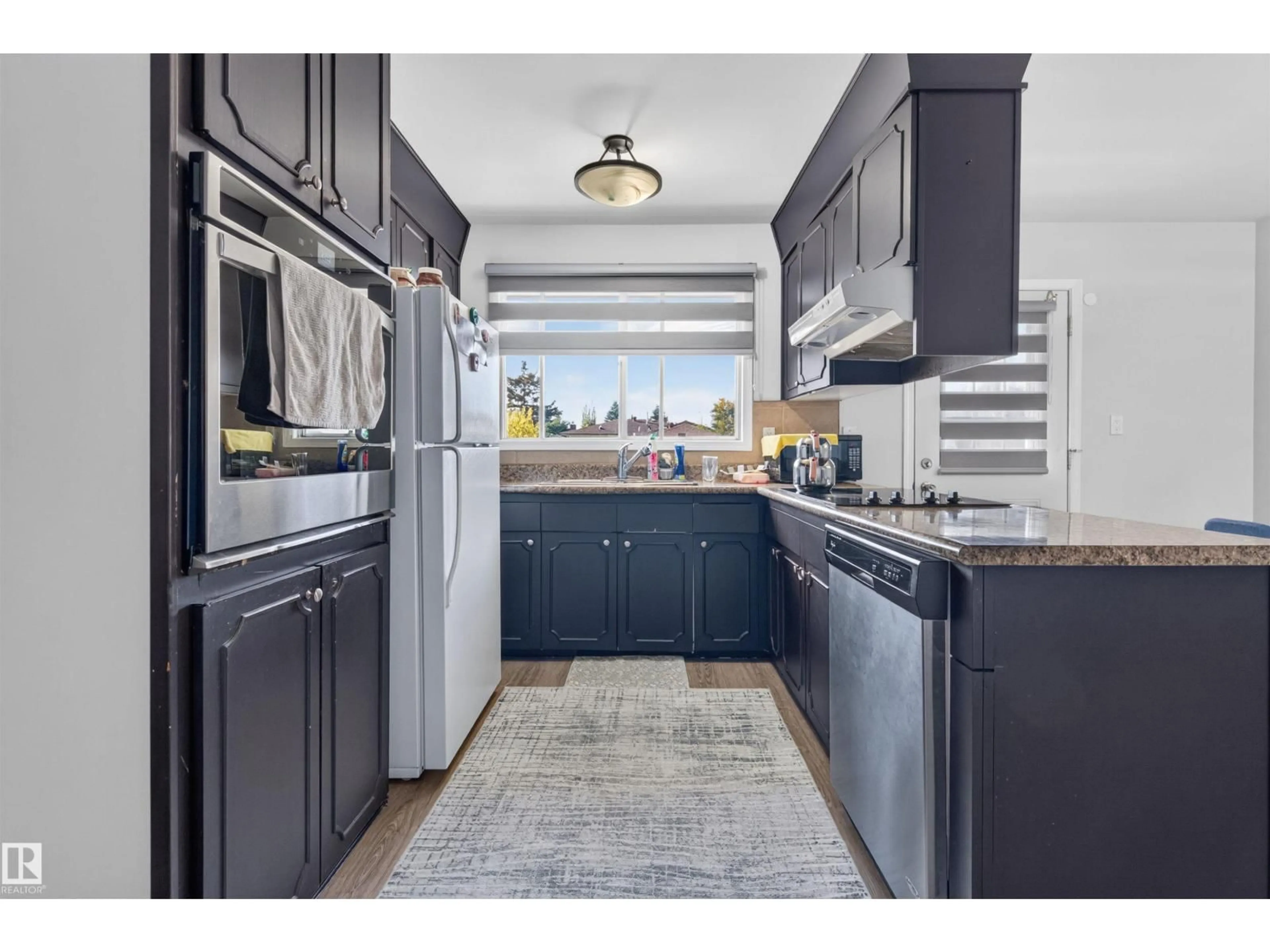 Open concept kitchen, ceramic/tile floor for 15104 74 ST, Edmonton Alberta T5C0Y7