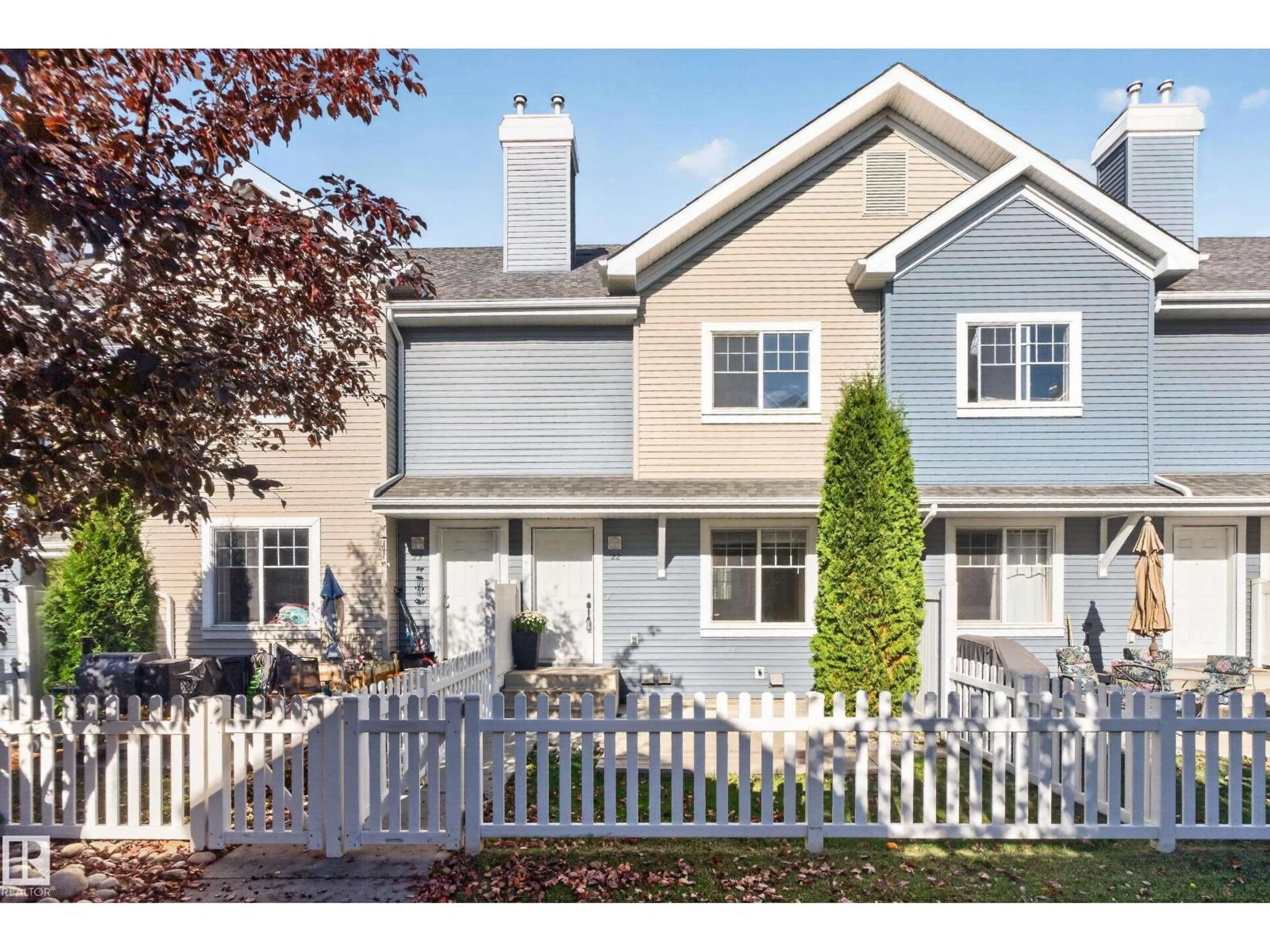 Home with vinyl exterior material, street for #22 - 8304 11 AV, Edmonton Alberta T6X1J8