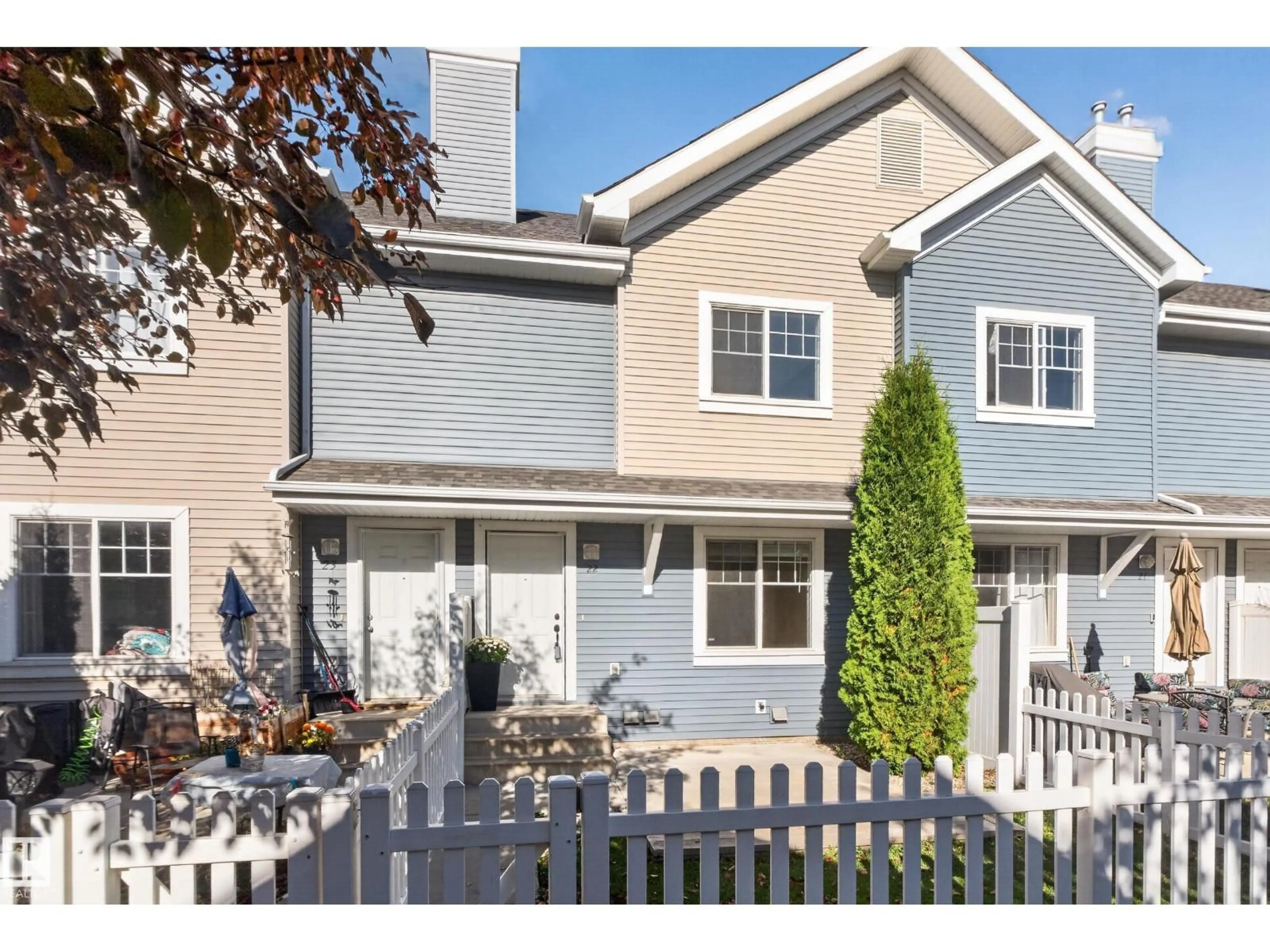 Home with vinyl exterior material, street for #22 - 8304 11 AV, Edmonton Alberta T6X1J8
