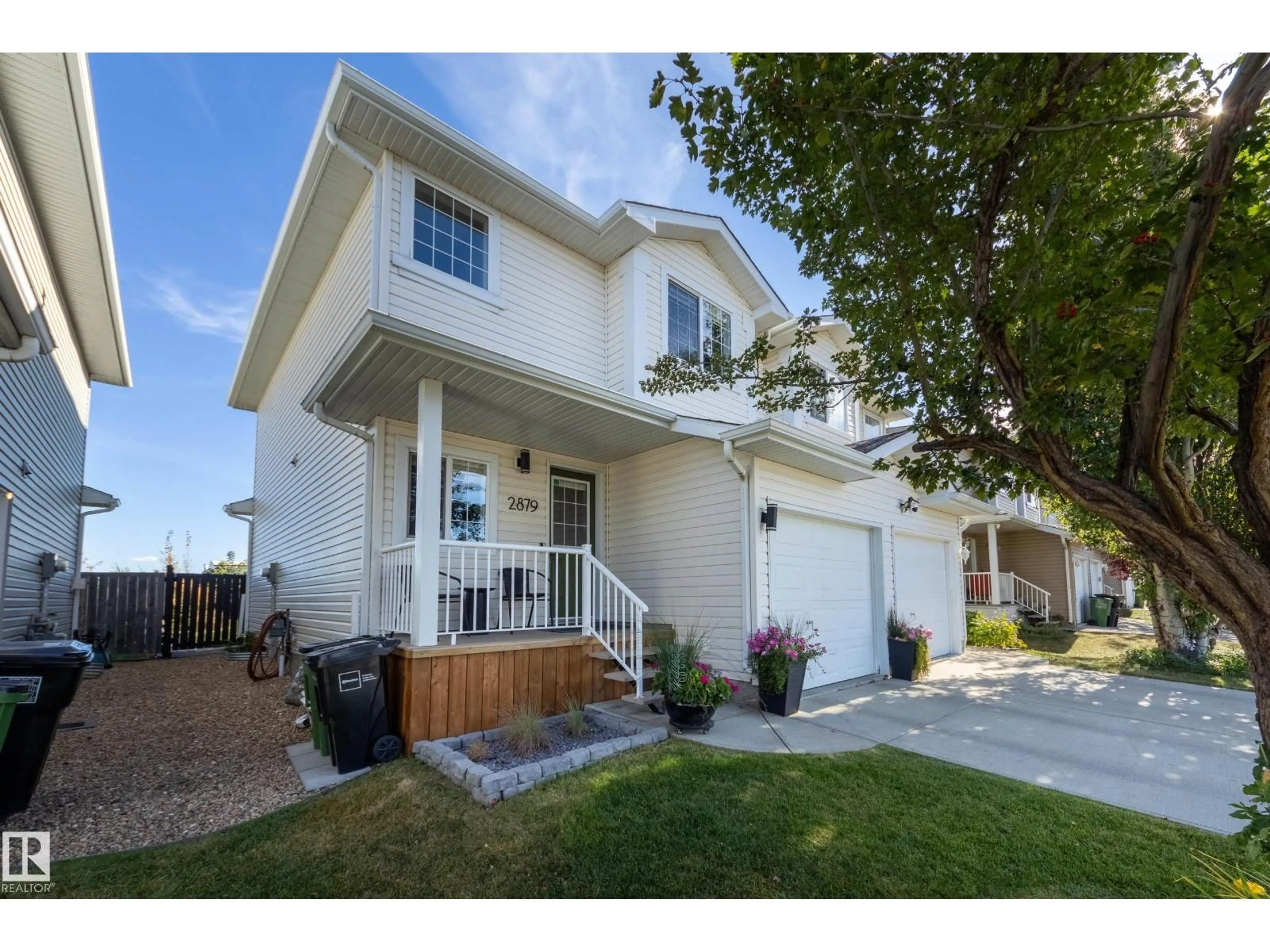 Home with vinyl exterior material, street for 2879 23 ST, Edmonton Alberta T6T0A2