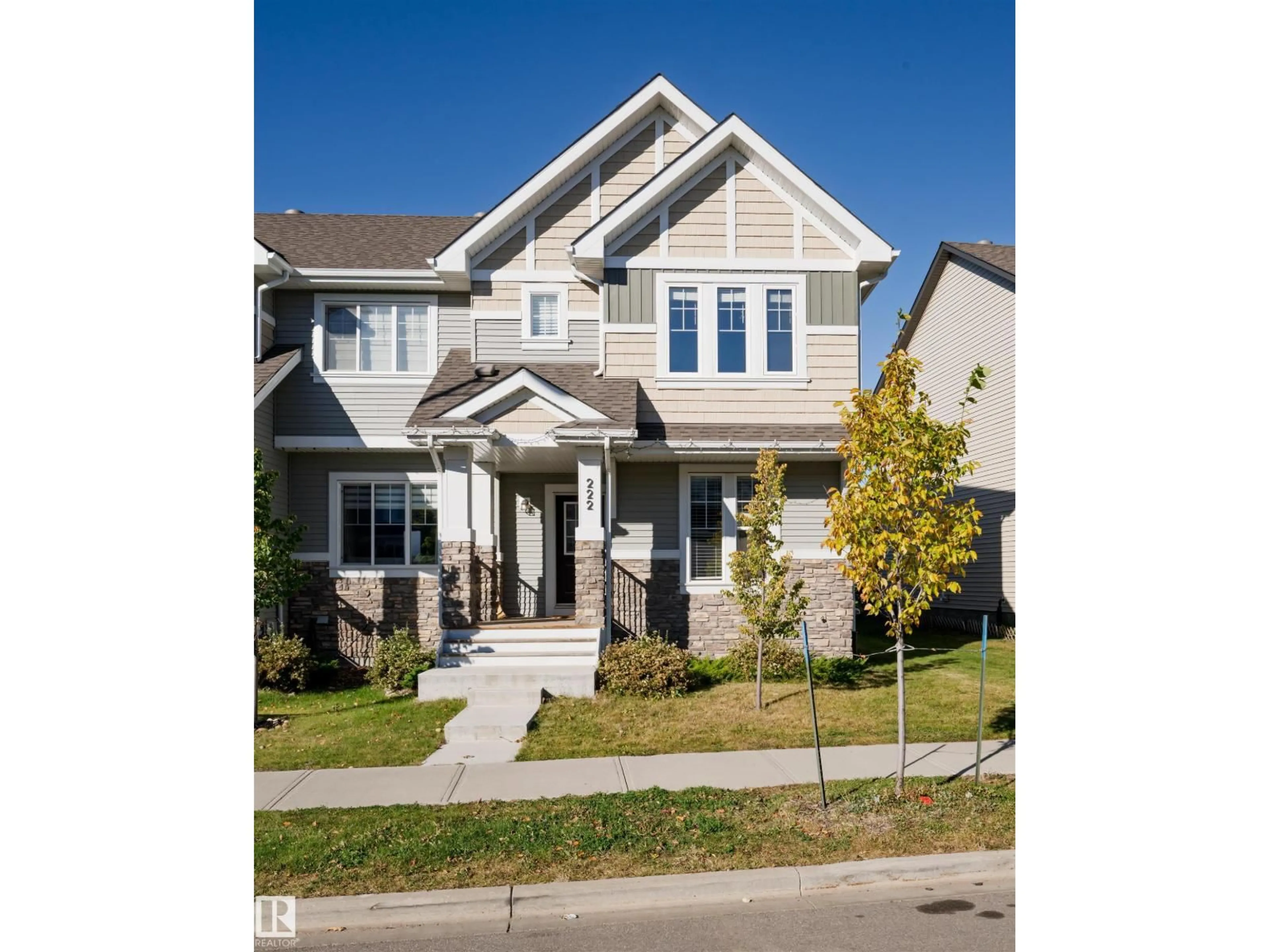 Home with vinyl exterior material, street for 222 DESROCHERS BV, Edmonton Alberta T6W4N2