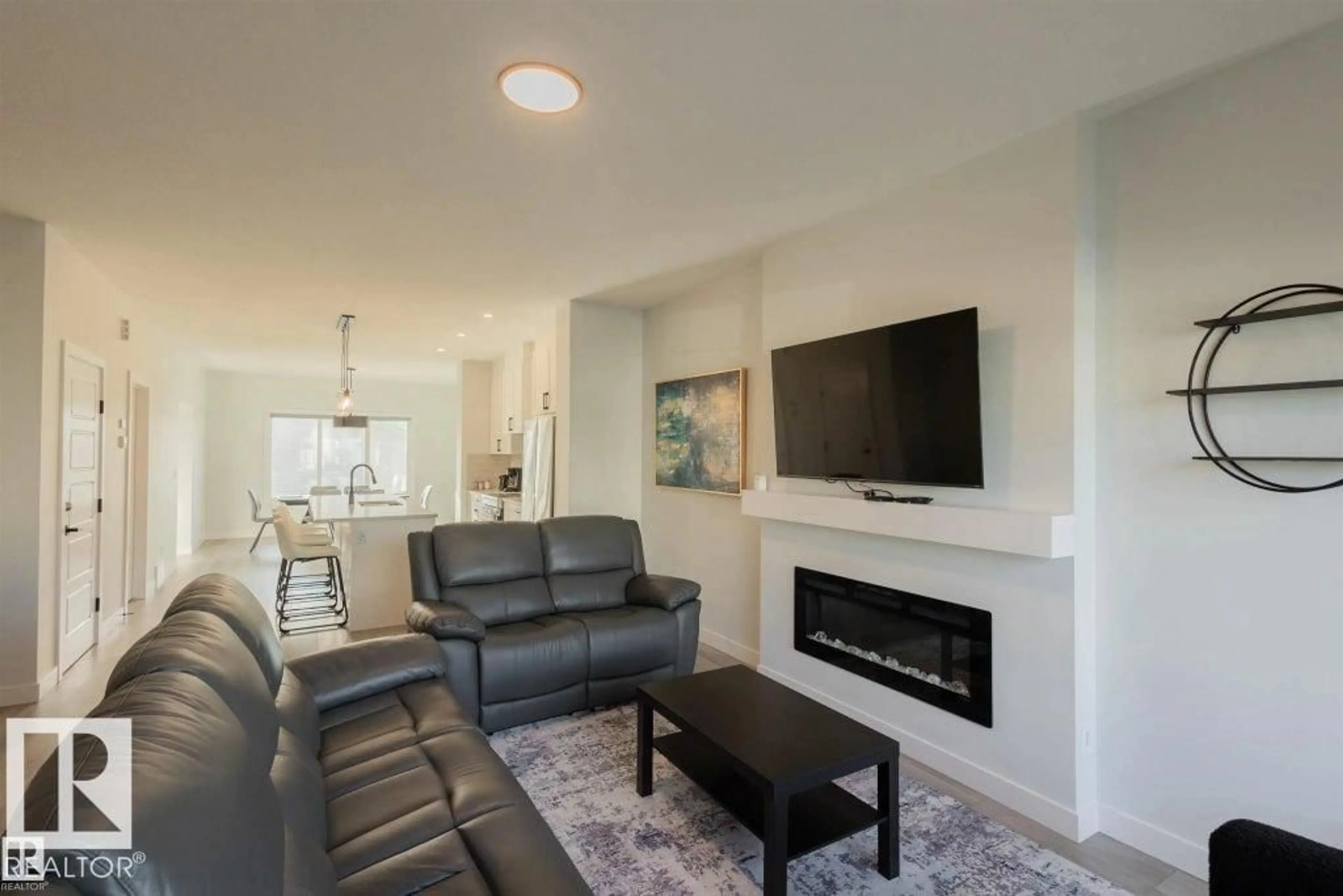 Living room with furniture, unknown for NW - 22519 88 AV, Edmonton Alberta T5T7W7