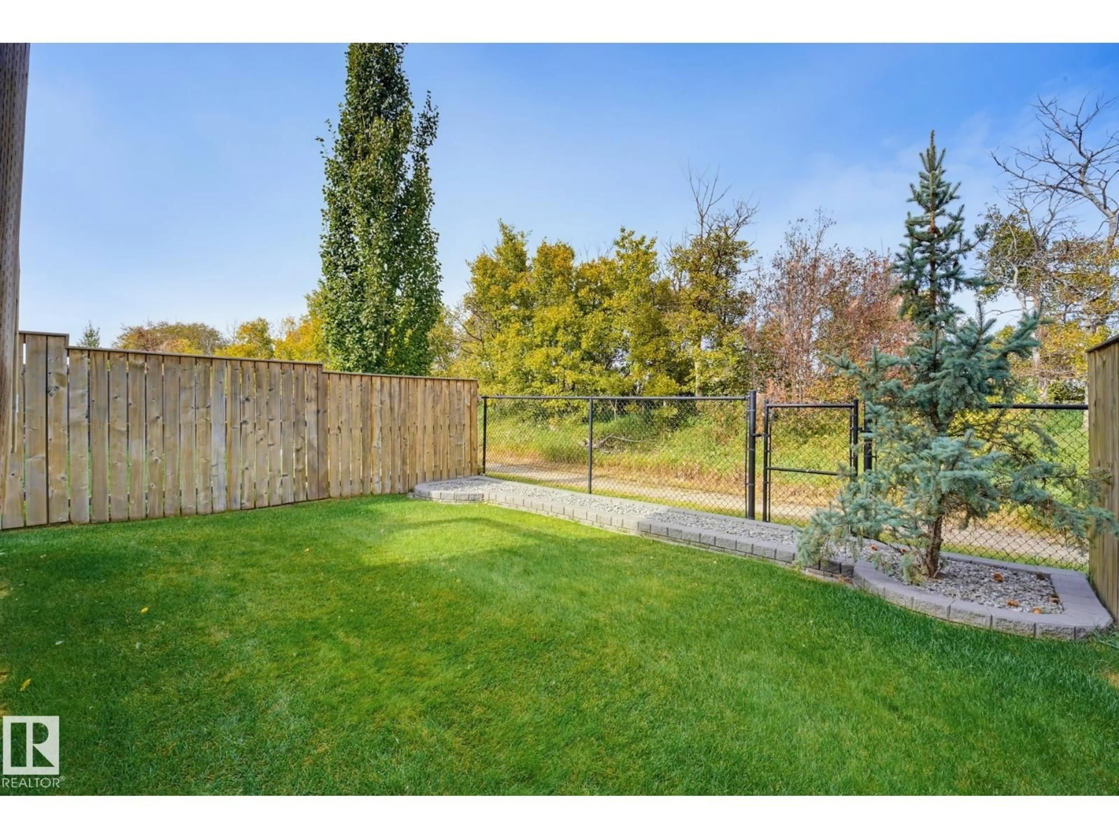 Patio, forest/trees view for 12250 173A AV, Edmonton Alberta T5X0K1