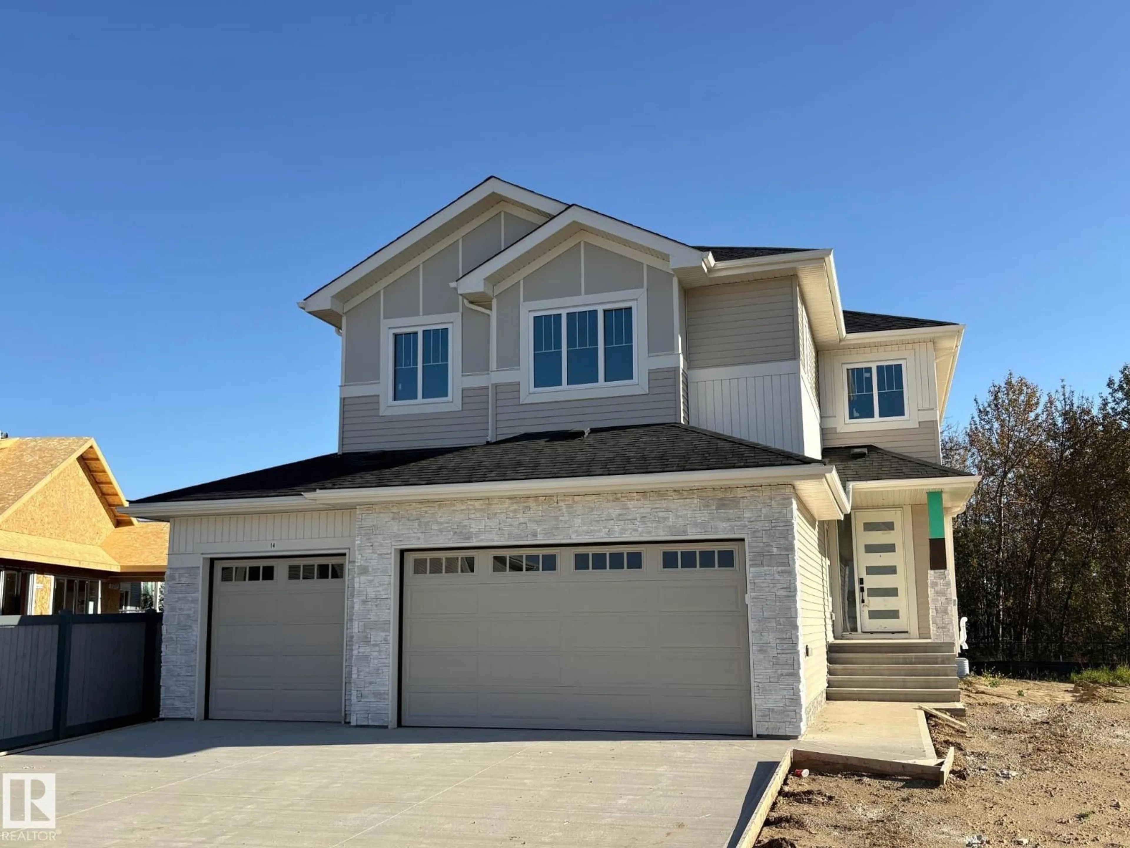 Home with vinyl exterior material, street for 14 ARTHUR WY, Spruce Grove Alberta T7X0Y4
