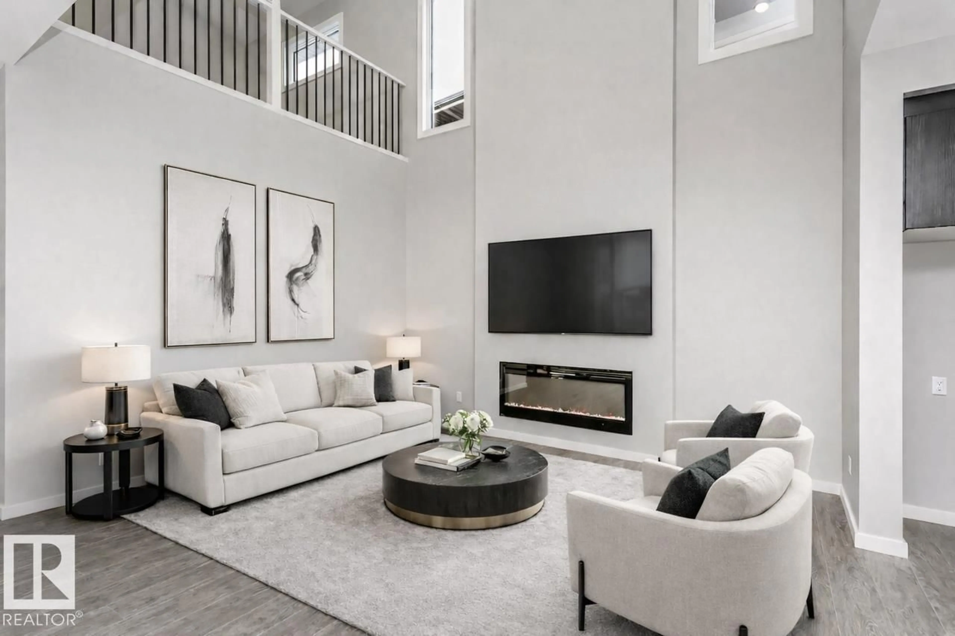 Living room with furniture, unknown for NW - 17236 5 ST, Edmonton Alberta T5Y6G4