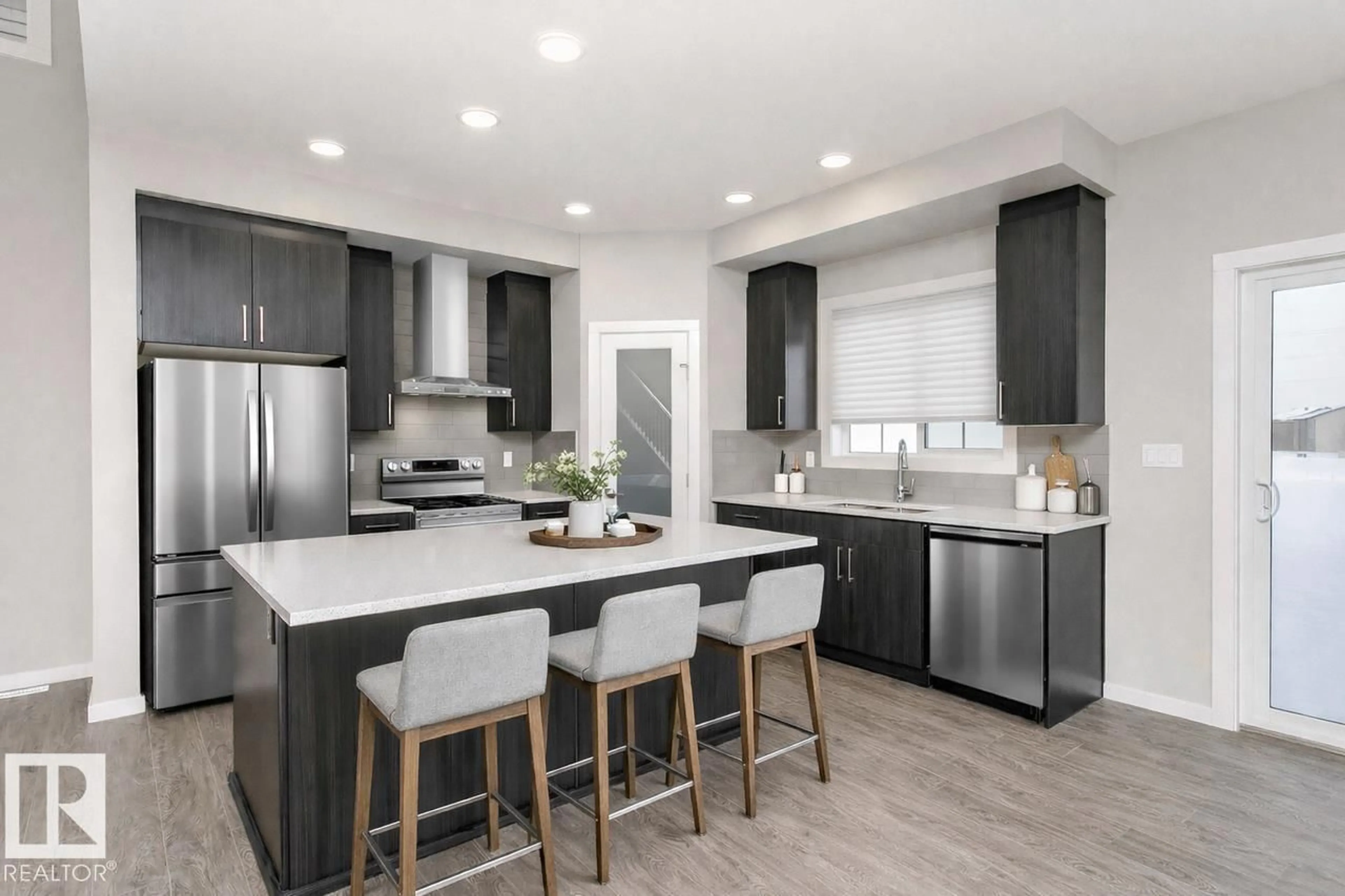 Open concept kitchen, unknown for NW - 17236 5 ST, Edmonton Alberta T5Y6G4