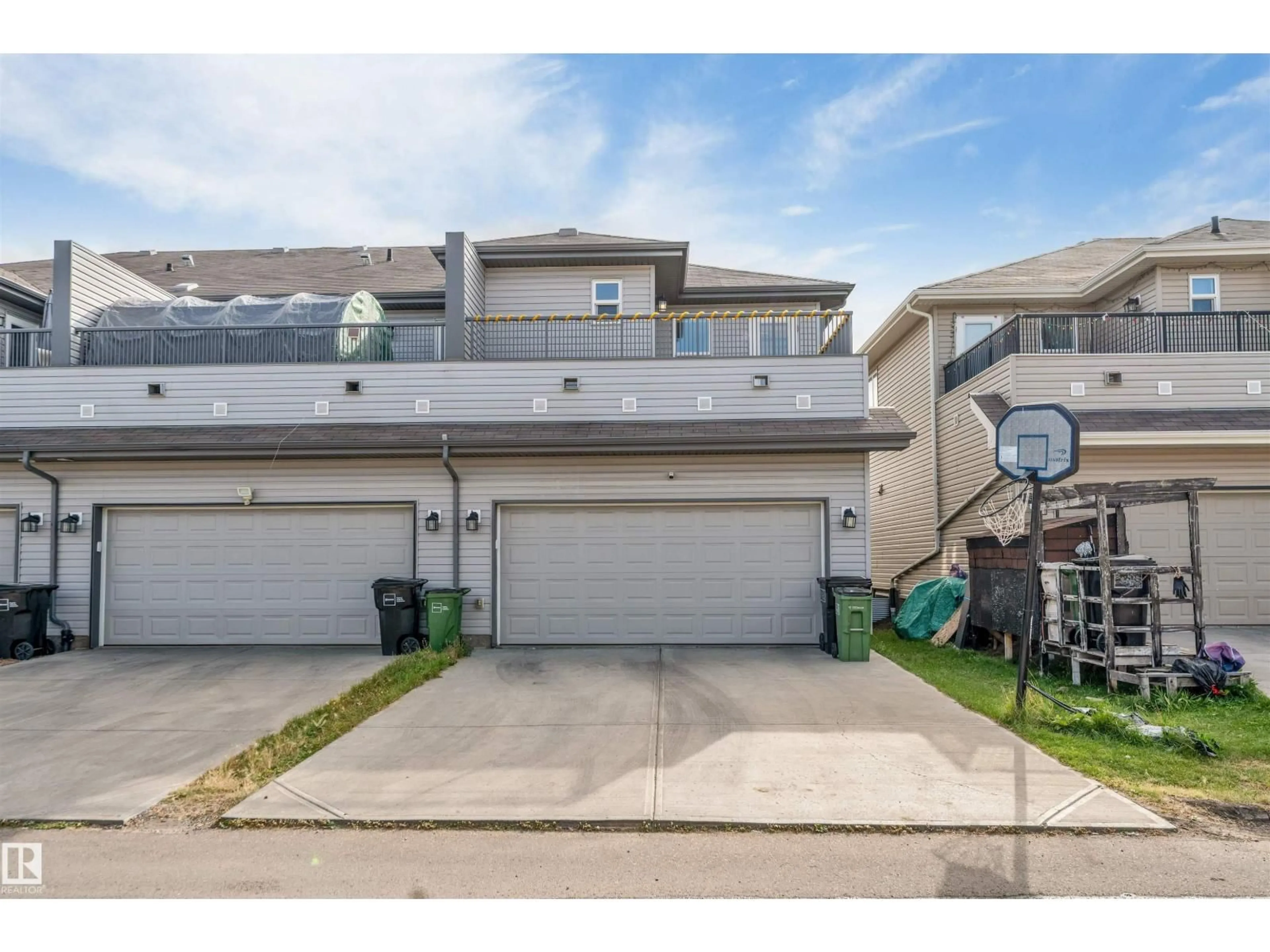 A pic from outside/outdoor area/front of a property/back of a property/a pic from drone, street for 1410 26 AV, Edmonton Alberta T6T0W1