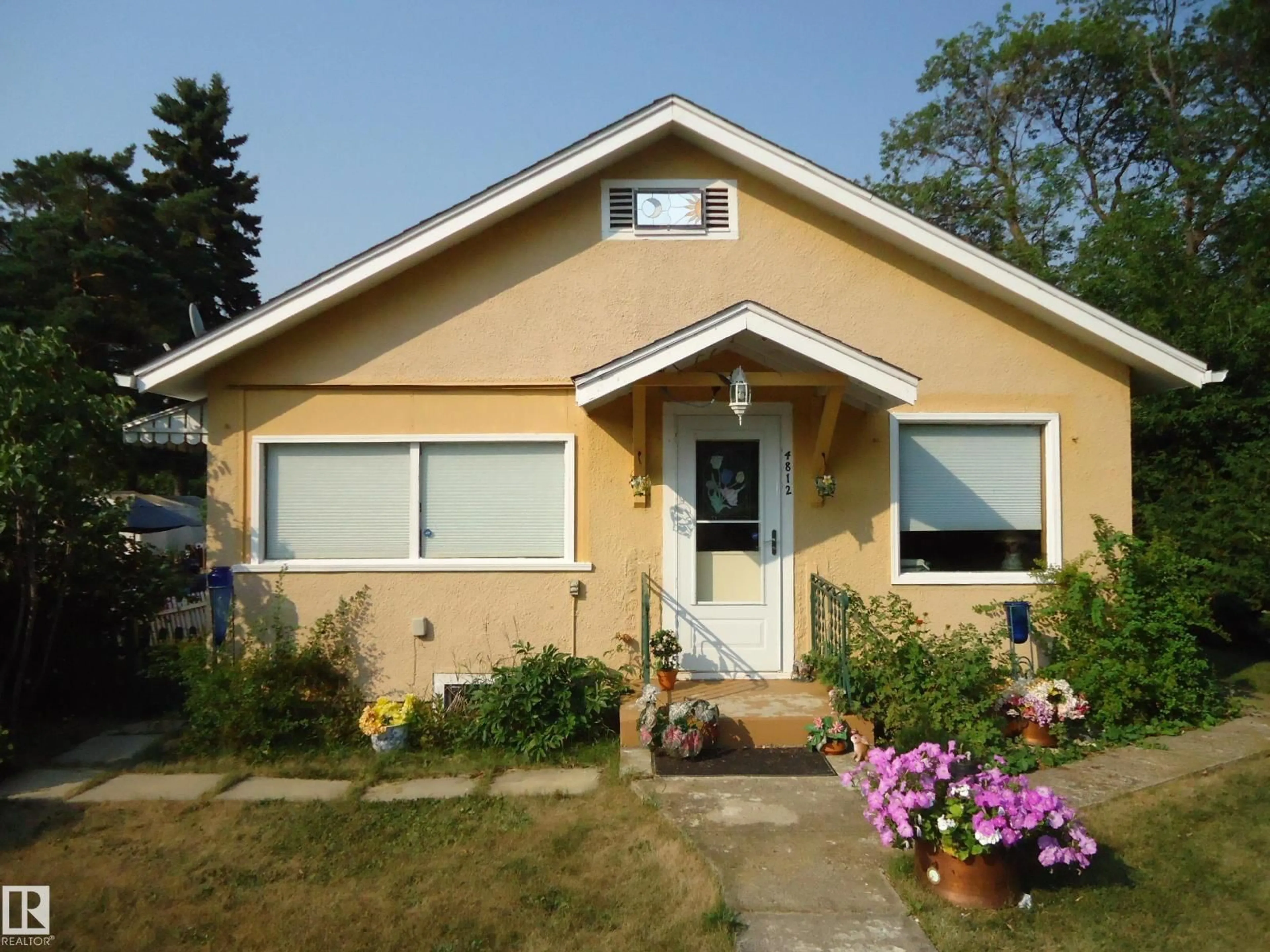 Home with vinyl exterior material, street for 4812 50 AV, Holden Alberta T0B2C0