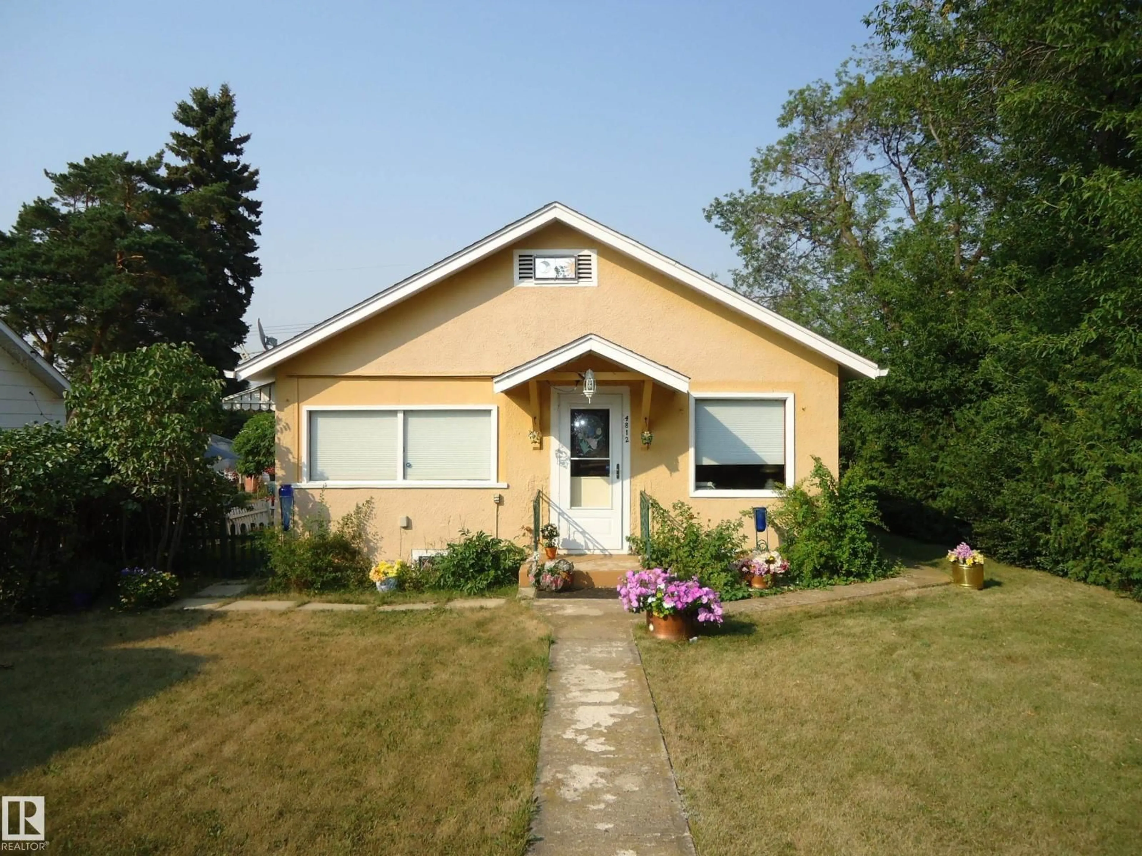 Home with vinyl exterior material, street for 4812 50 AV, Holden Alberta T0B2C0