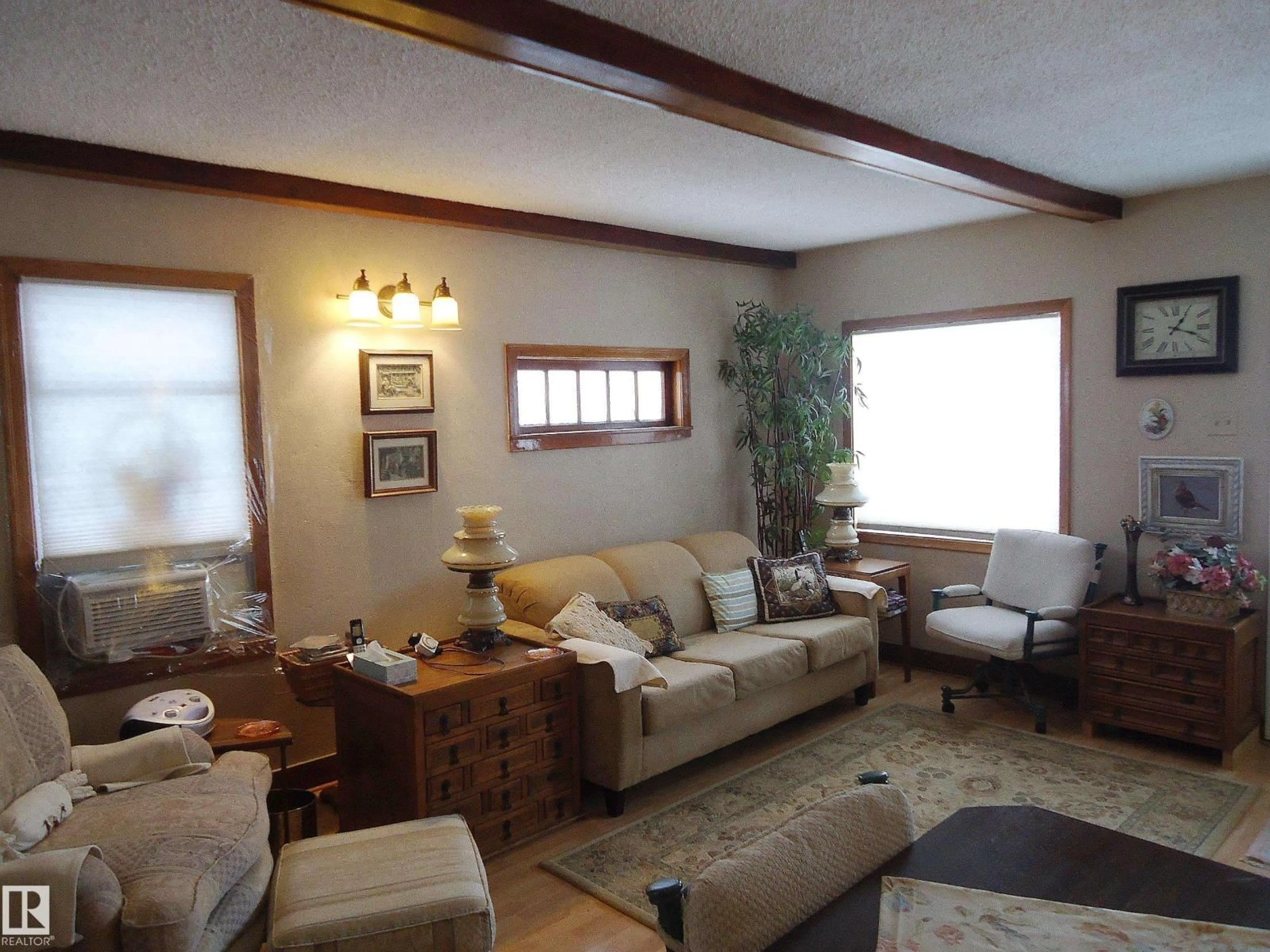 Living room with furniture, unknown for 4812 50 AV, Holden Alberta T0B2C0