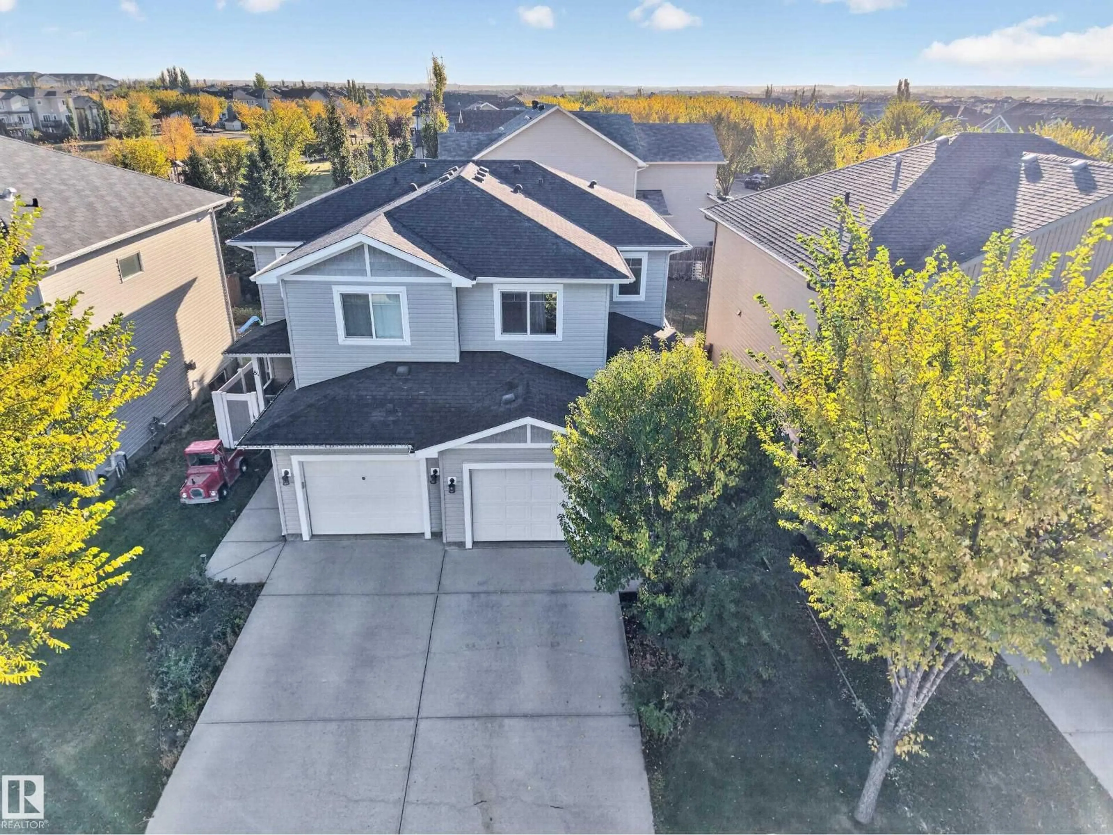 A pic from outside/outdoor area/front of a property/back of a property/a pic from drone, unknown for 83 RADCLIFFE WD, Fort Saskatchewan Alberta T8L0M6