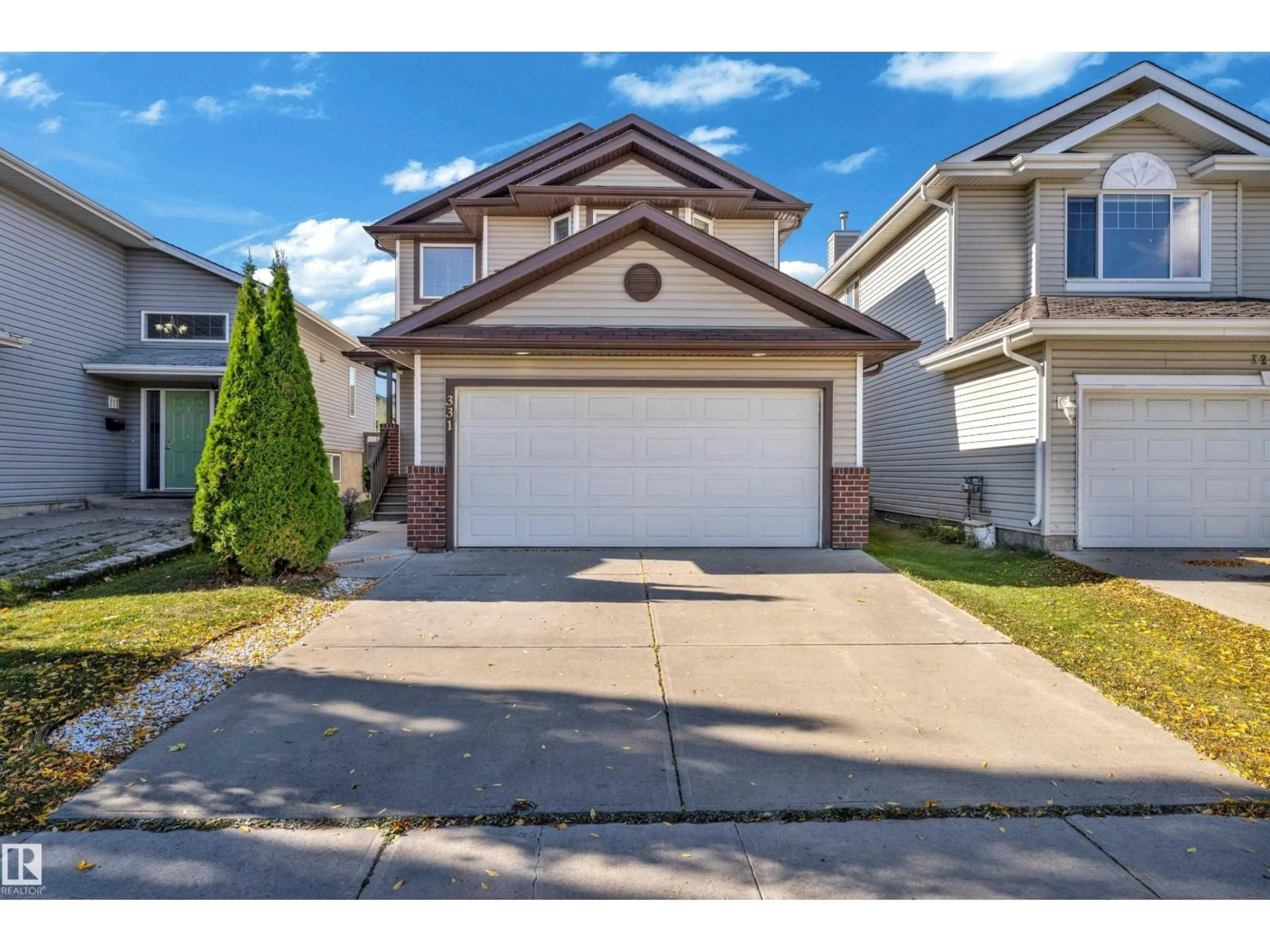 Home with vinyl exterior material, street for 331 SILVER BERRY RD, Edmonton Alberta T6T2A7