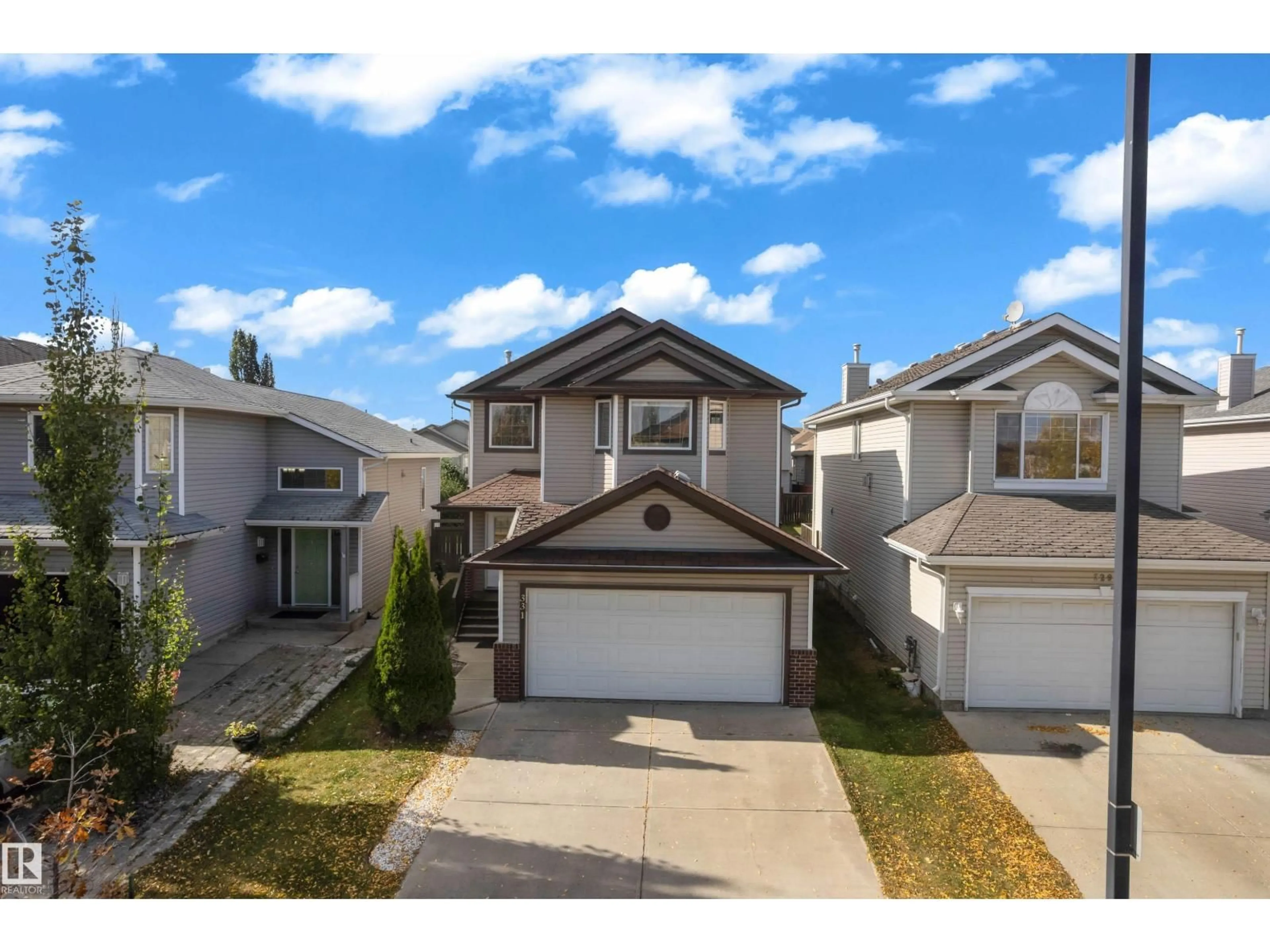 A pic from outside/outdoor area/front of a property/back of a property/a pic from drone, street for 331 SILVER BERRY RD, Edmonton Alberta T6T2A7