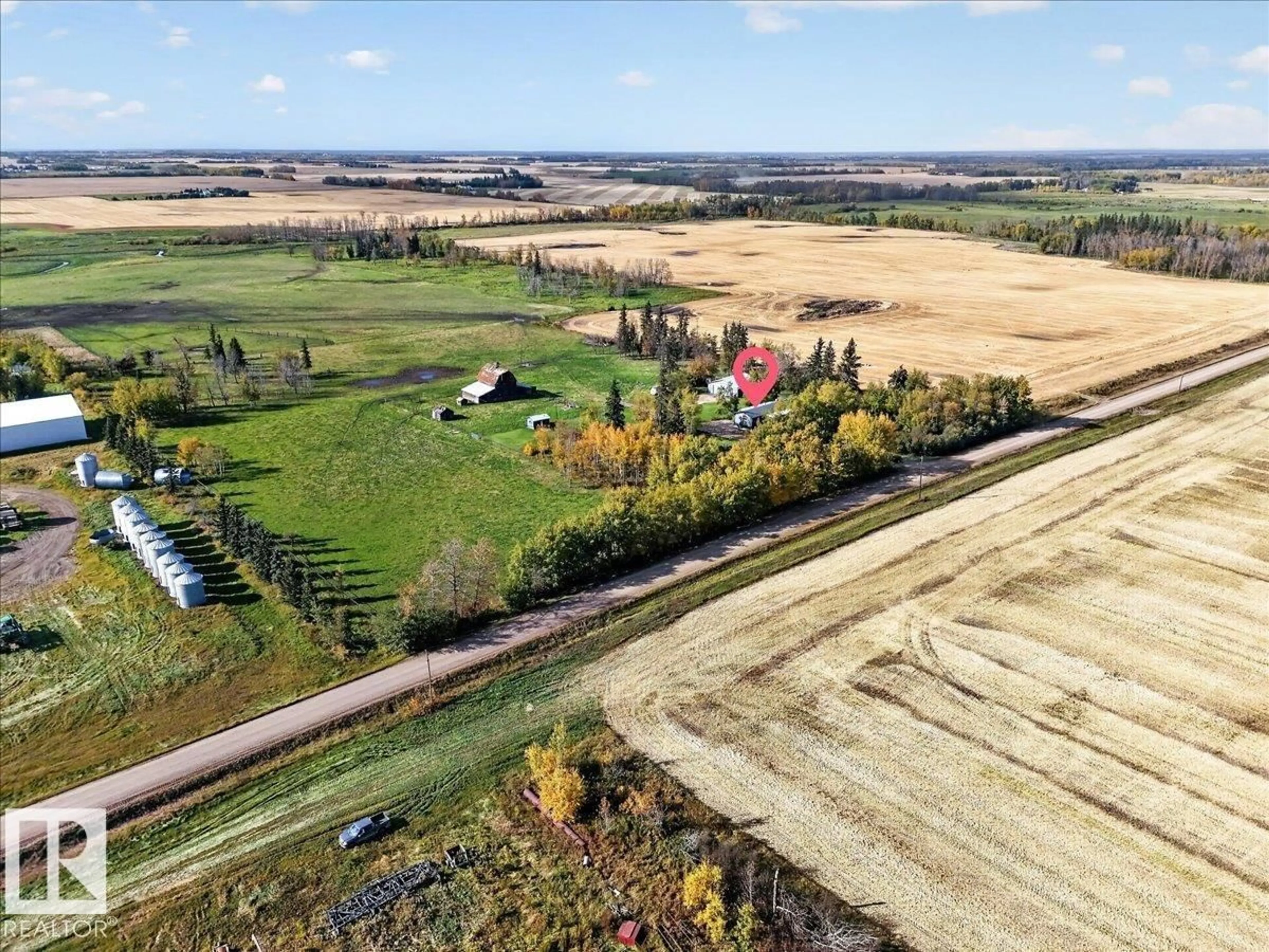 A pic from outside/outdoor area/front of a property/back of a property/a pic from drone, unknown for 59304 RGE ROAD 271, Rural Westlock County Alberta T0G1W0