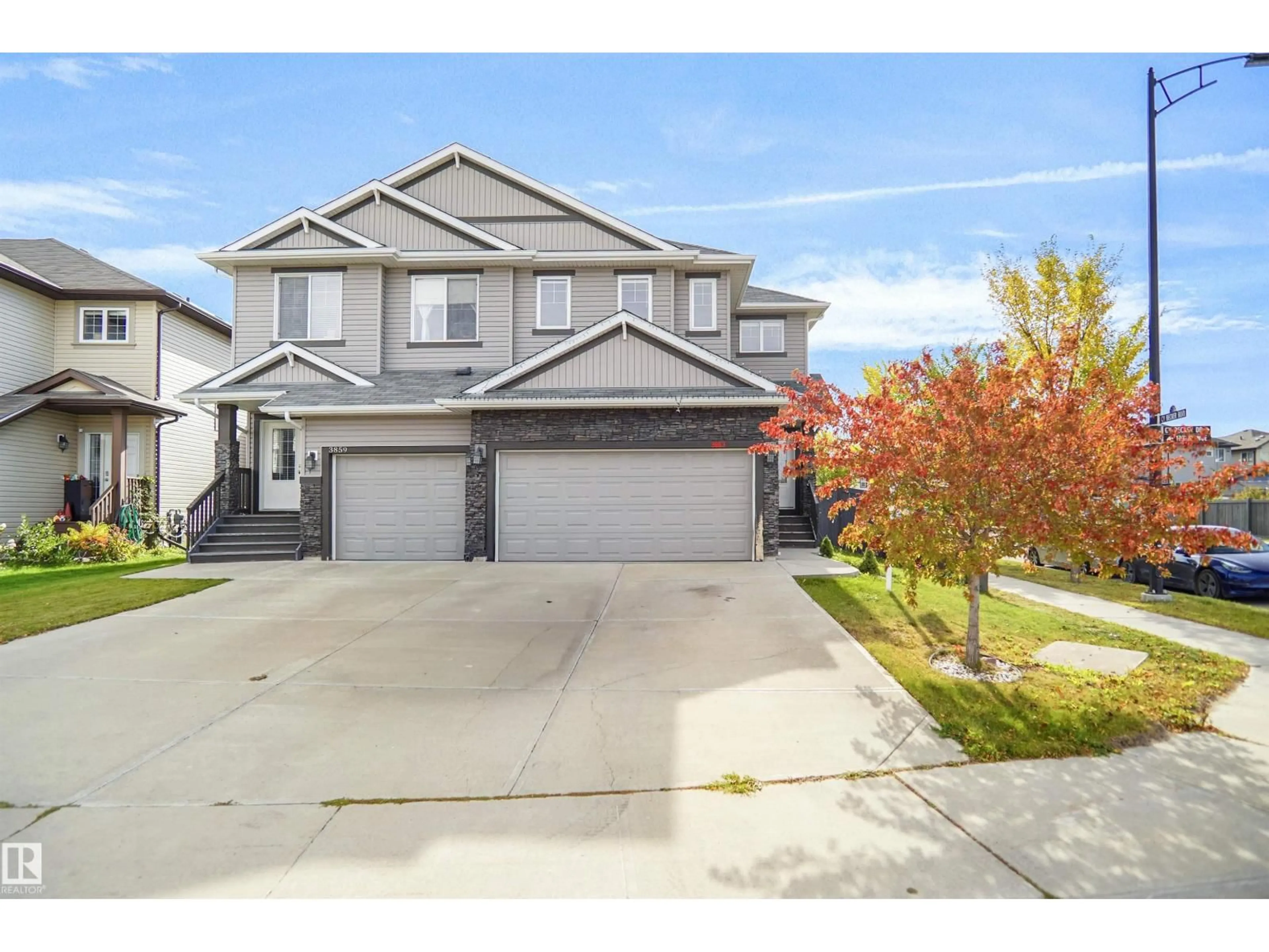A pic from outside/outdoor area/front of a property/back of a property/a pic from drone, street for 3863 170 AV, Edmonton Alberta T5Y3S2
