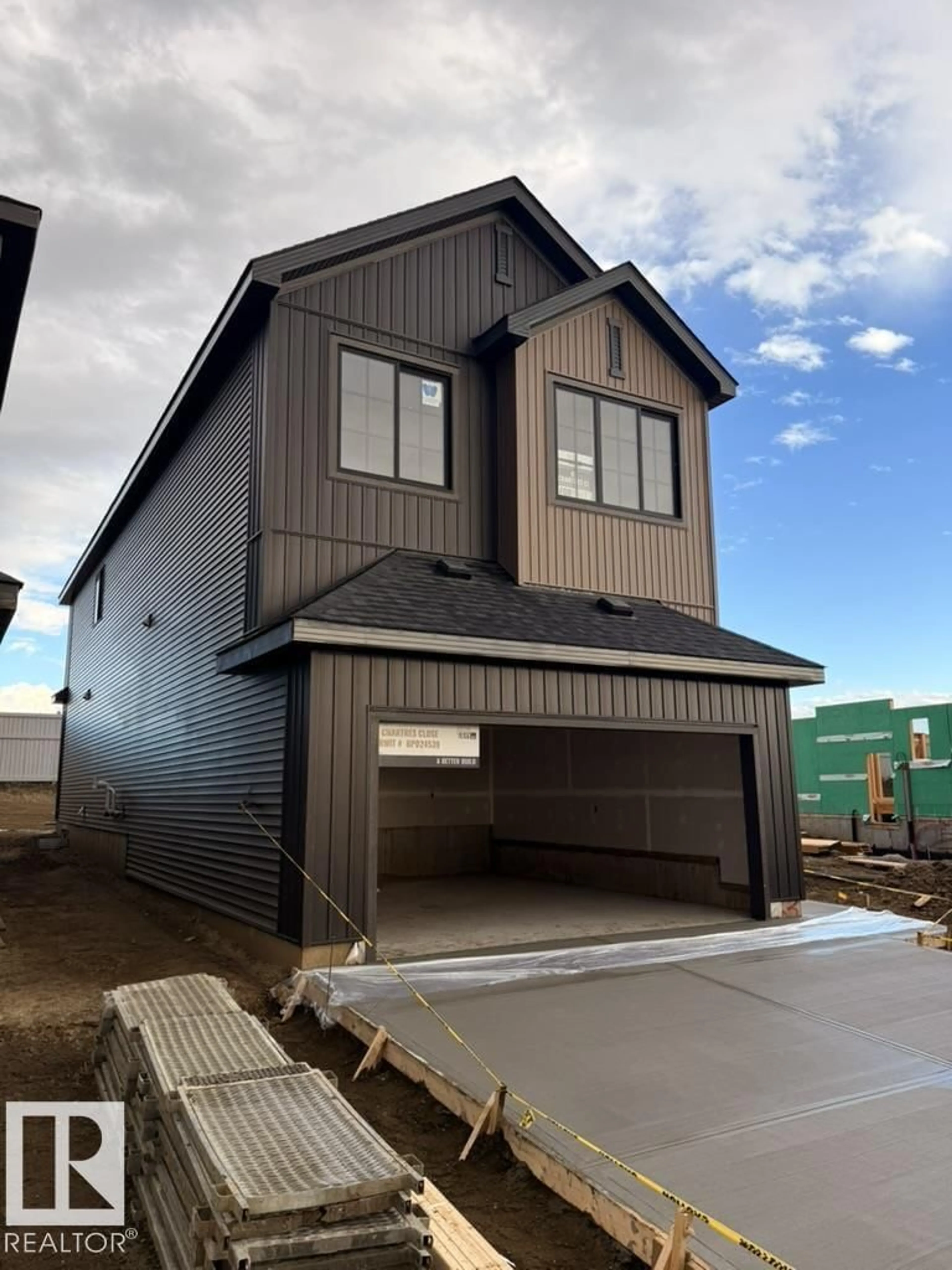 Home with vinyl exterior material, street for 63 CHARTRES CL, St. Albert Alberta T8T2E1