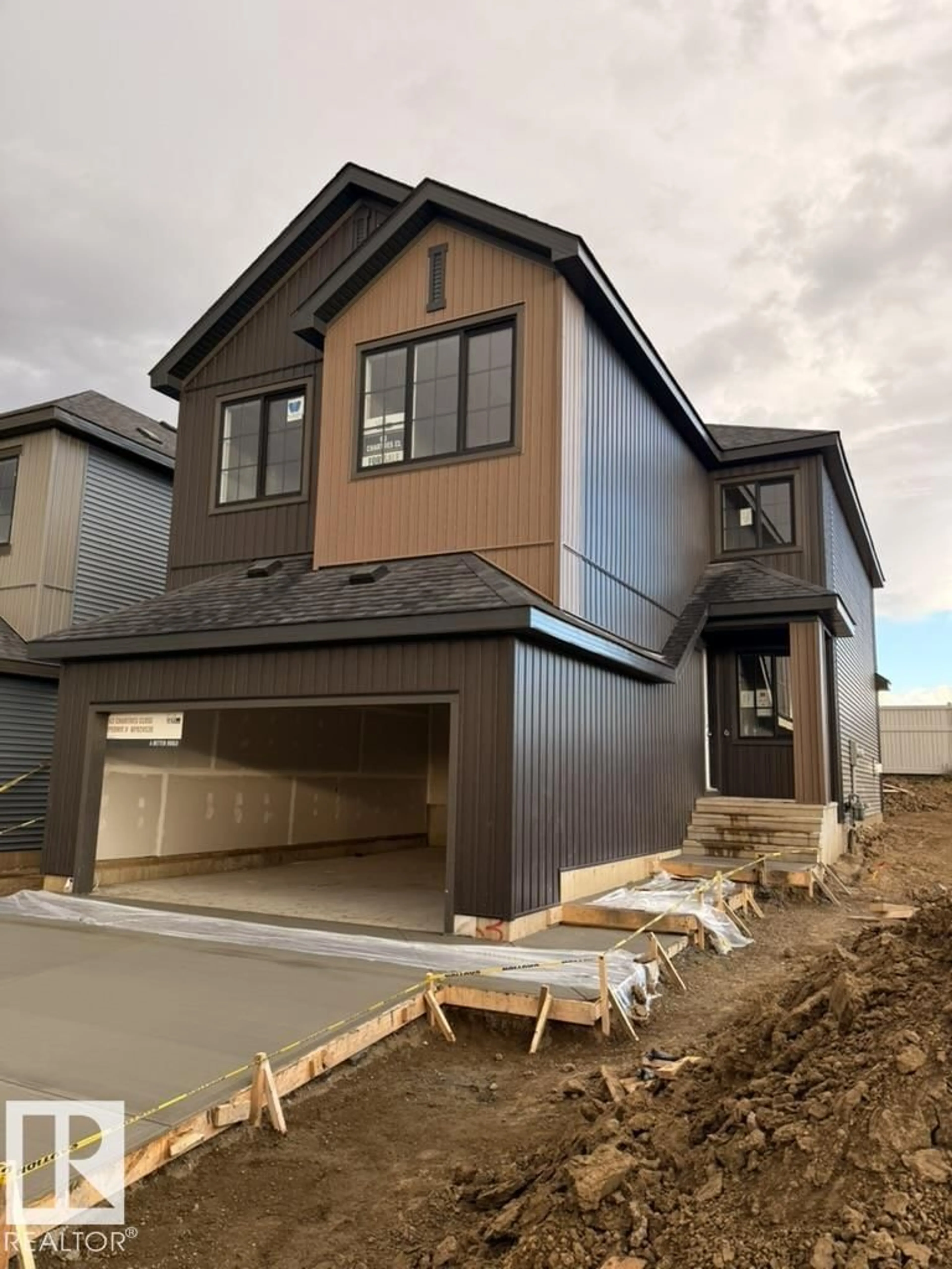Home with vinyl exterior material, street for 63 CHARTRES CL, St. Albert Alberta T8T2E1