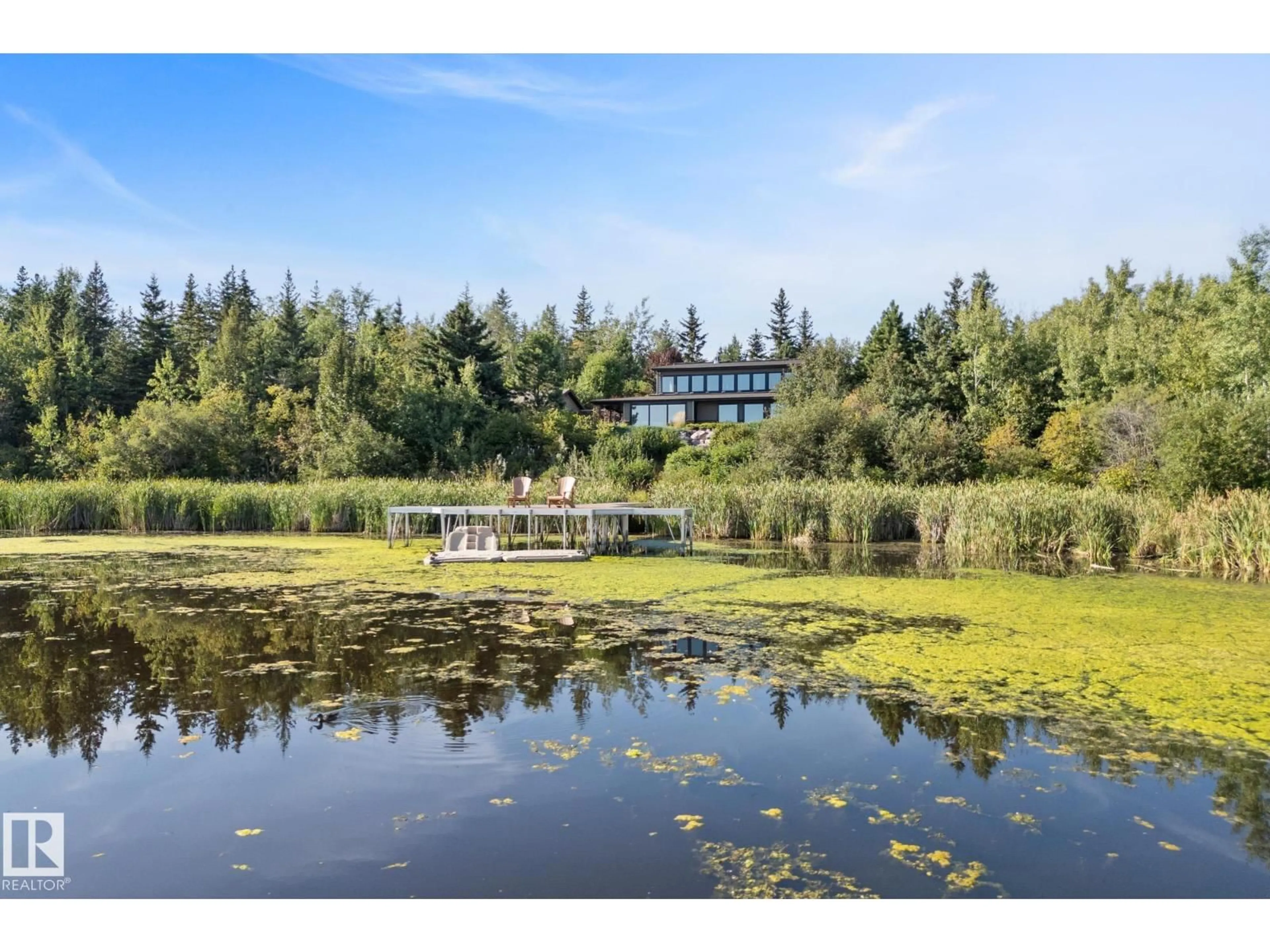 A pic from outside/outdoor area/front of a property/back of a property/a pic from drone, water/lake/river/ocean view for 51109 RGE ROAD 210, Rural Strathcona County Alberta T8G1E6