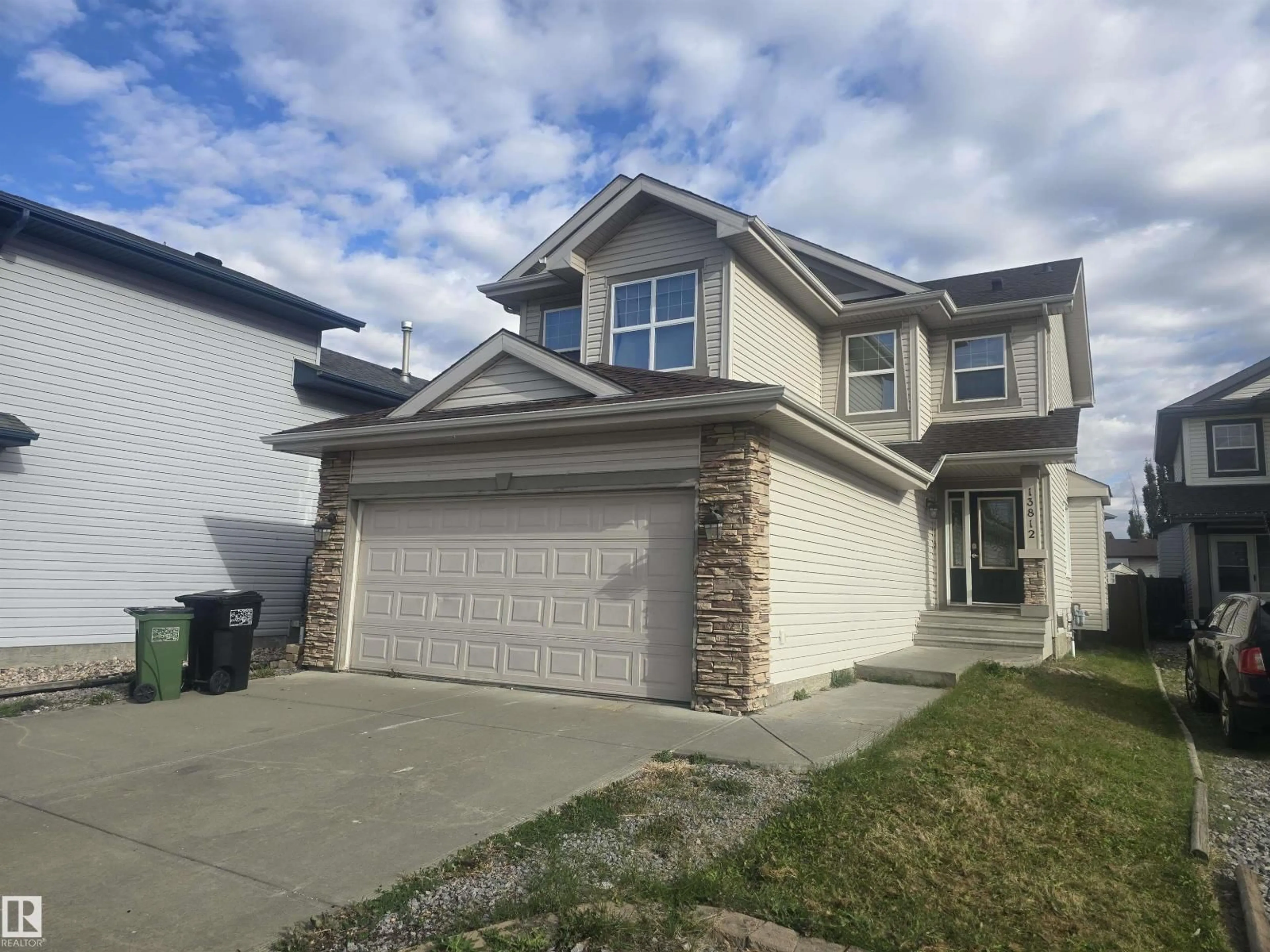Home with vinyl exterior material, street for NW - 13812 149 AV, Edmonton Alberta T6V1S1
