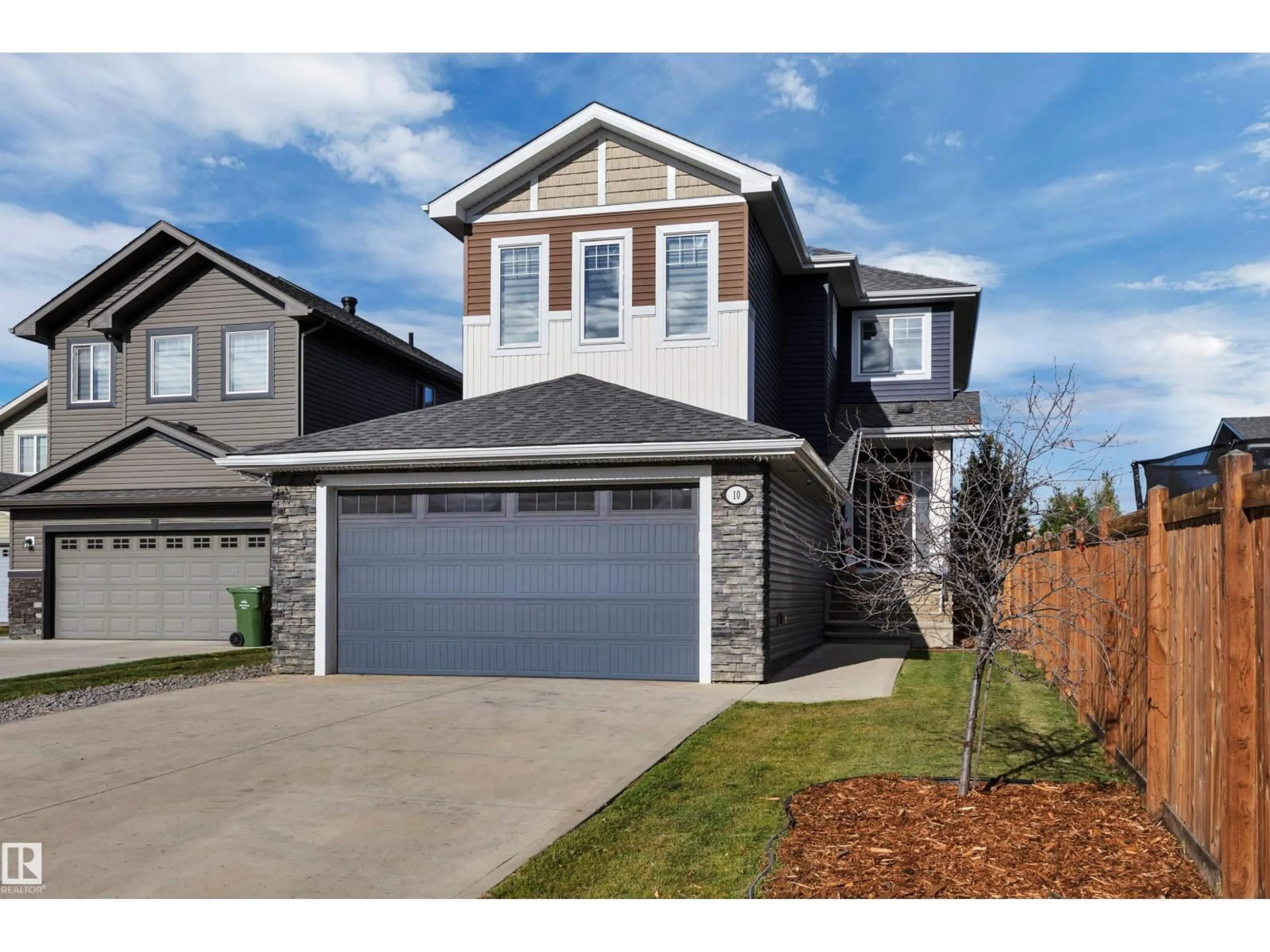 Home with vinyl exterior material, street for 10 MOBERG CL, Leduc Alberta T9E1E5