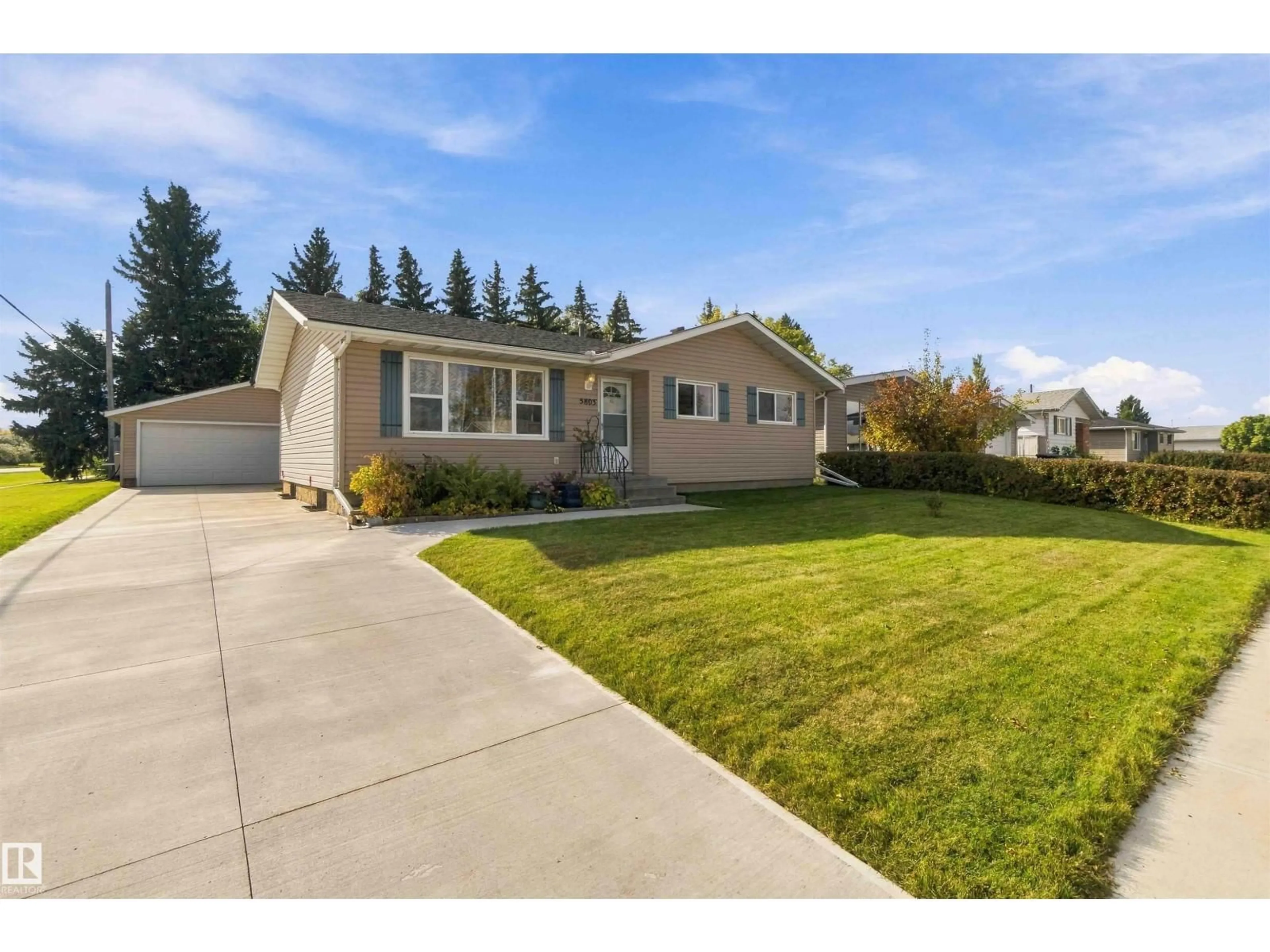 Home with vinyl exterior material, street for 5803 52 AV, Redwater Alberta T0A2W0