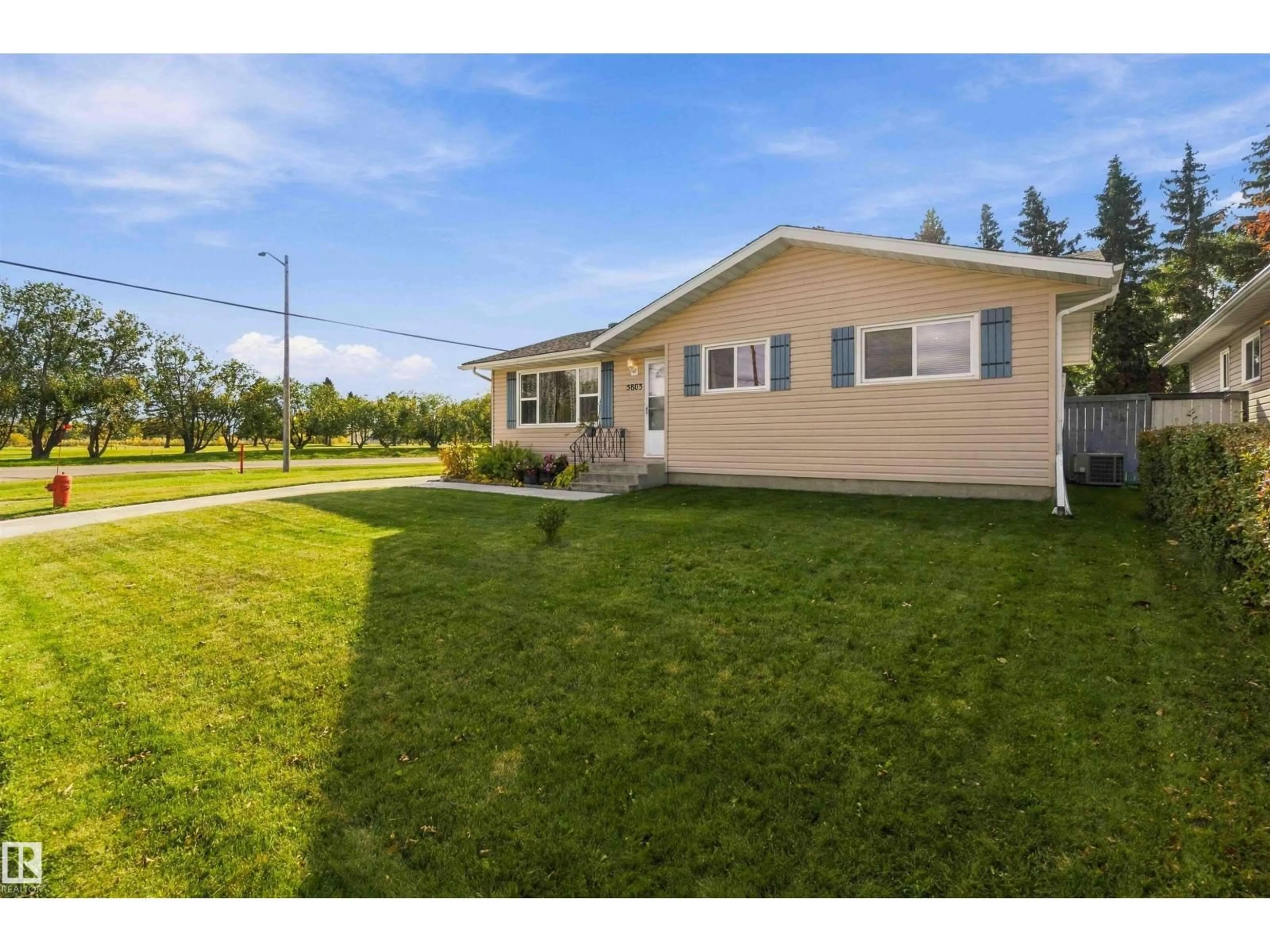 Home with vinyl exterior material, street for 5803 52 AV, Redwater Alberta T0A2W0