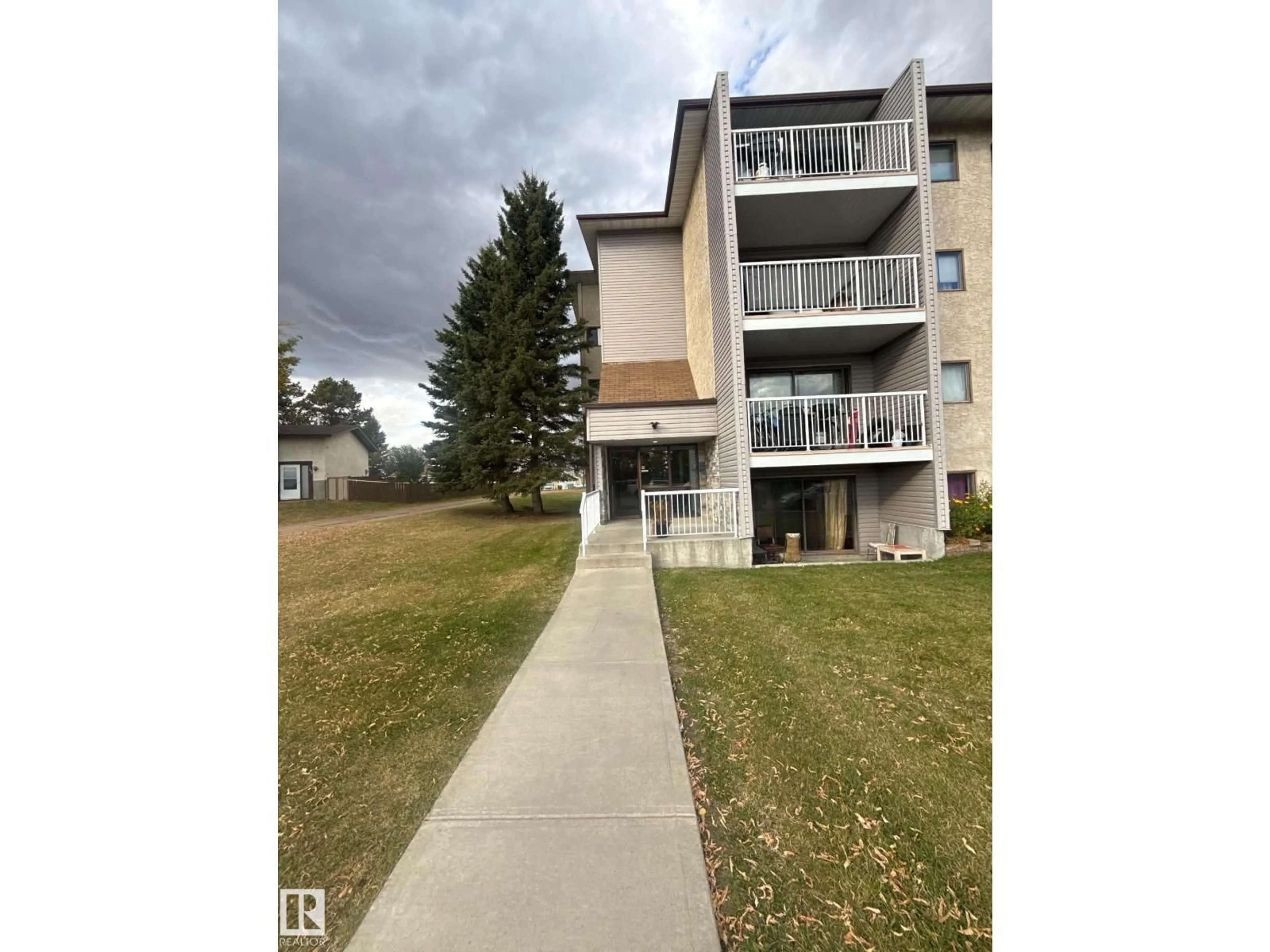 A pic from outside/outdoor area/front of a property/back of a property/a pic from drone, unknown for #302 - 51 BROWN ST, Stony Plain Alberta T7Z1P3