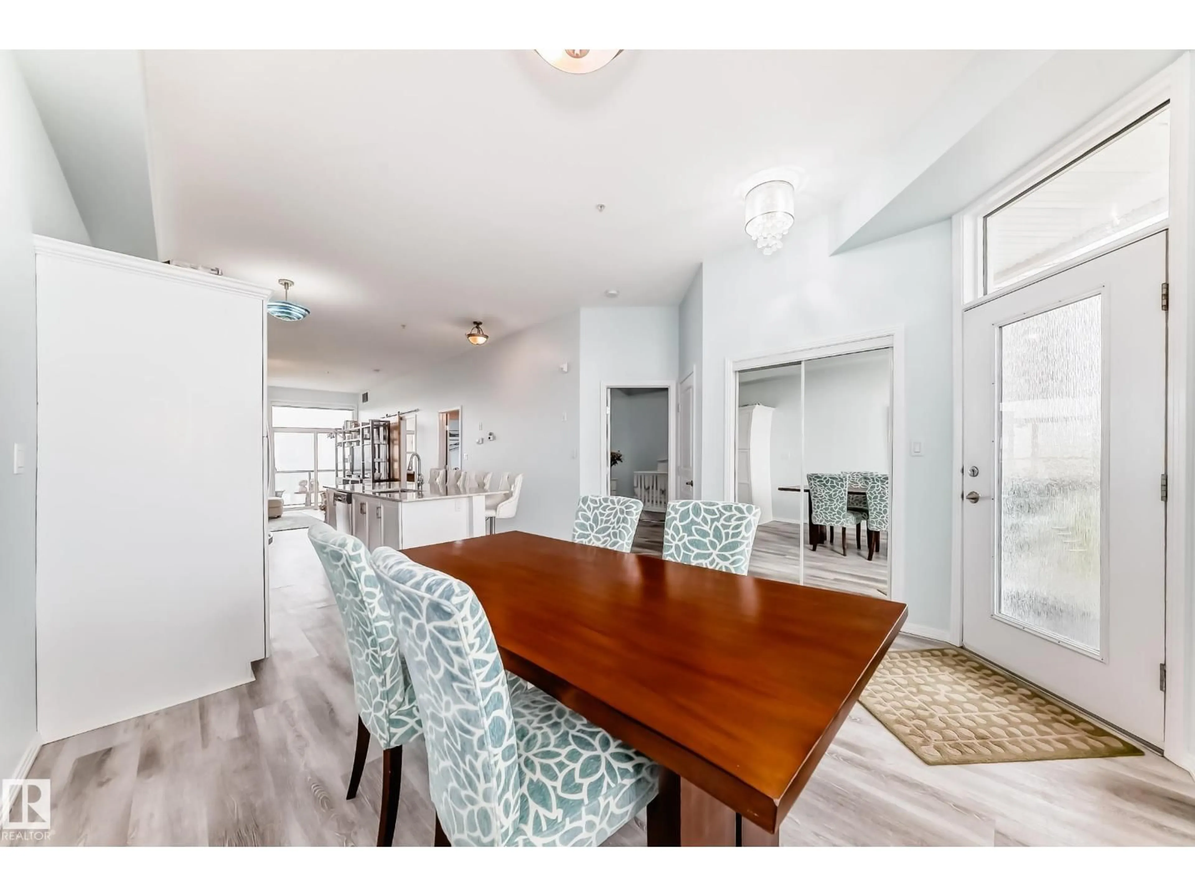 Dining room, wood/laminate floor for #414 - 9507 101 AV, Edmonton Alberta T5H4R1