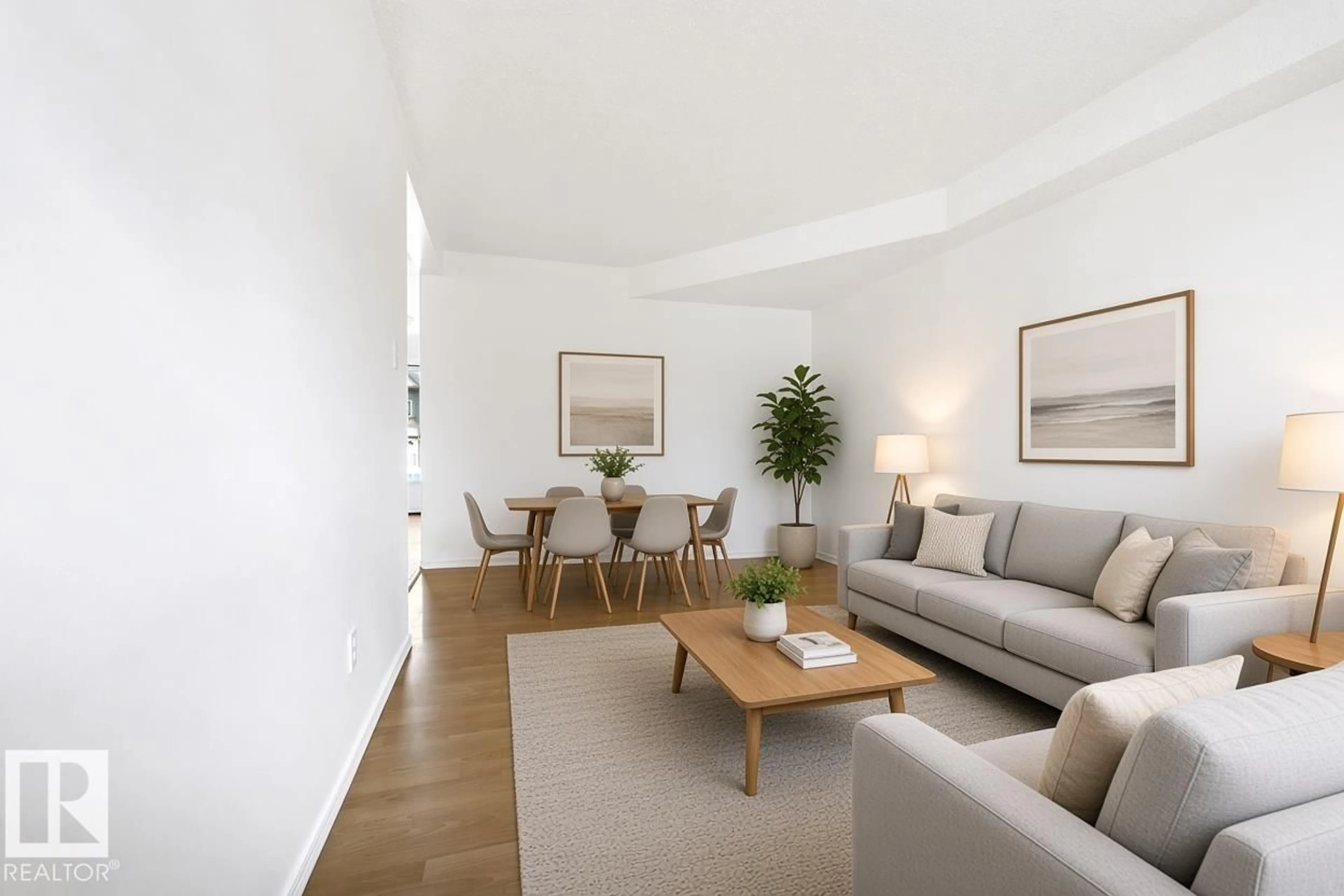 Living room with furniture, wood/laminate floor for 3122 142 AV, Edmonton Alberta T5Y1H2