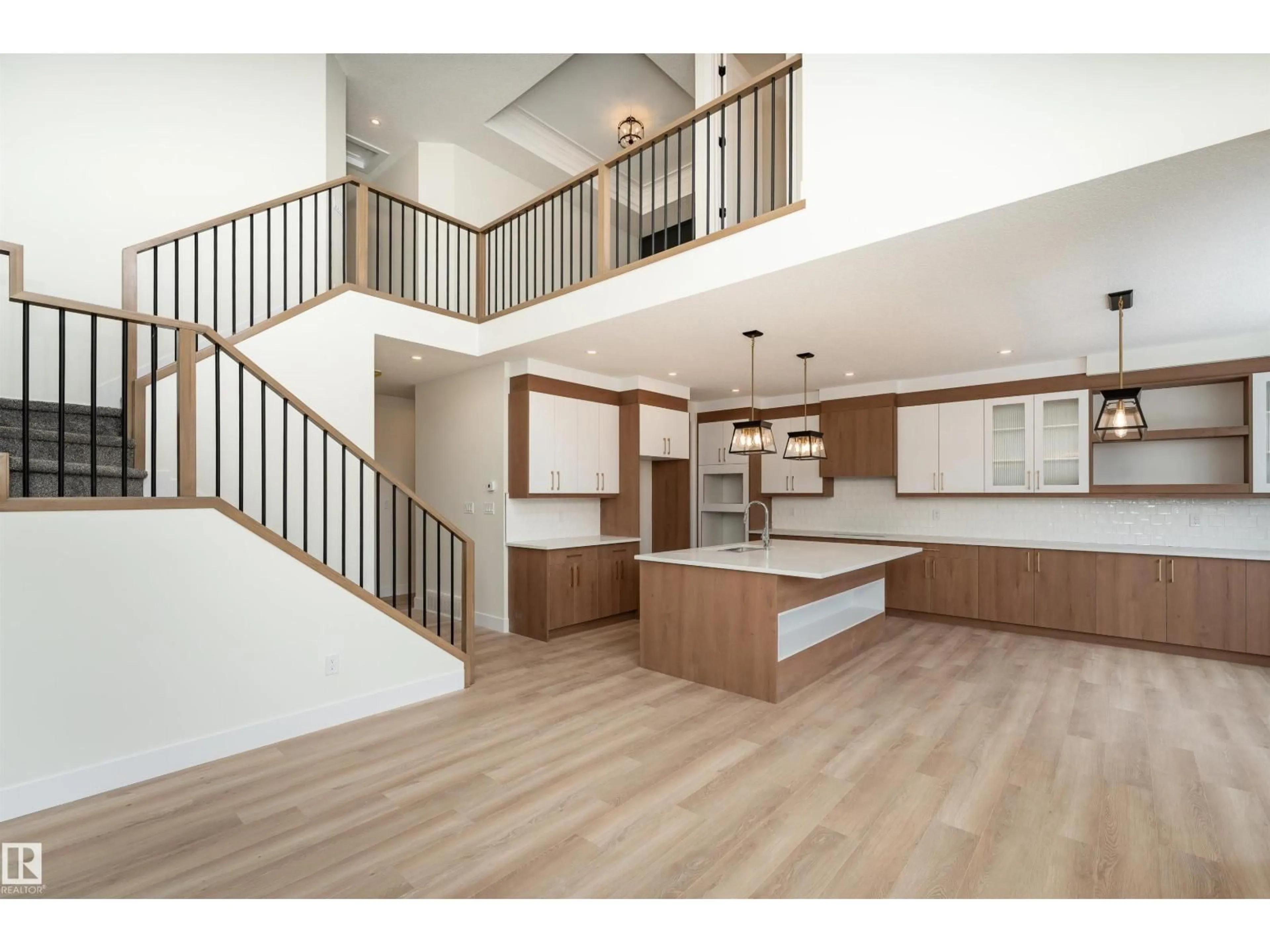 Open concept kitchen, wood/laminate floor for 60 LANDING TRAILS DR, Gibbons Alberta T0A1N0