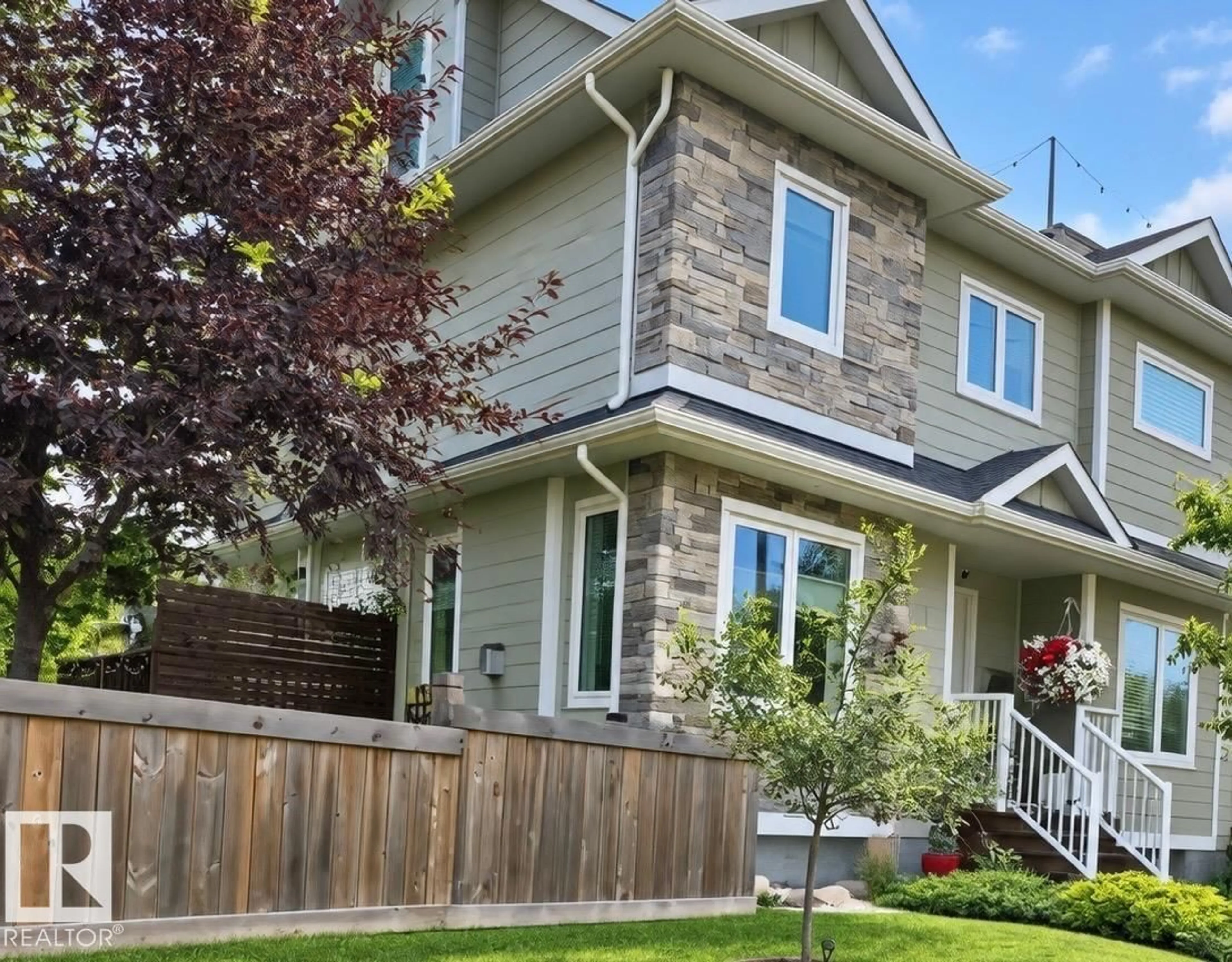 Home with vinyl exterior material, street for 7004 97 ST, Edmonton Alberta T6E3K1