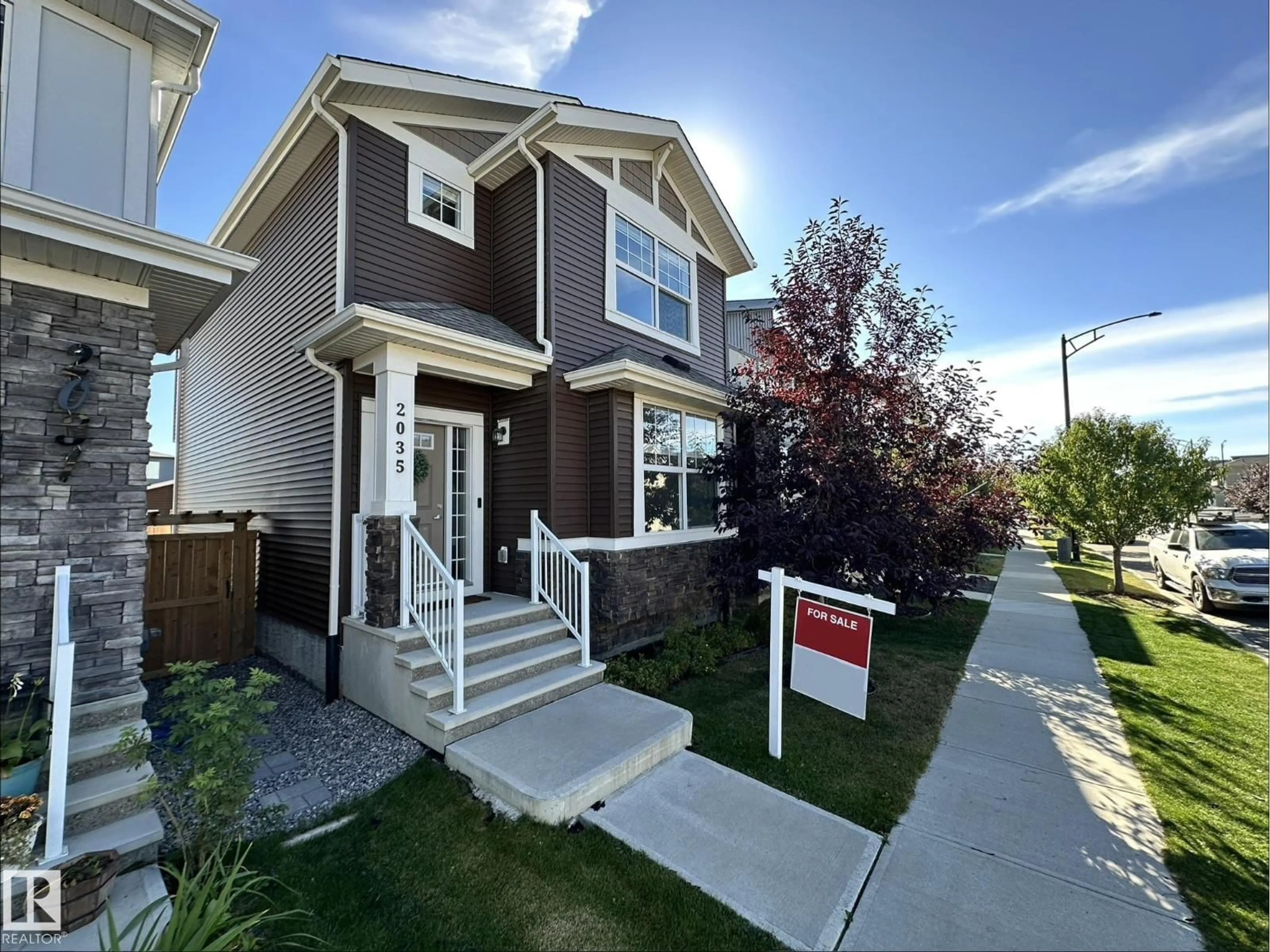 Home with vinyl exterior material, street for SW - 2035 160 ST, Edmonton Alberta T6W4E7