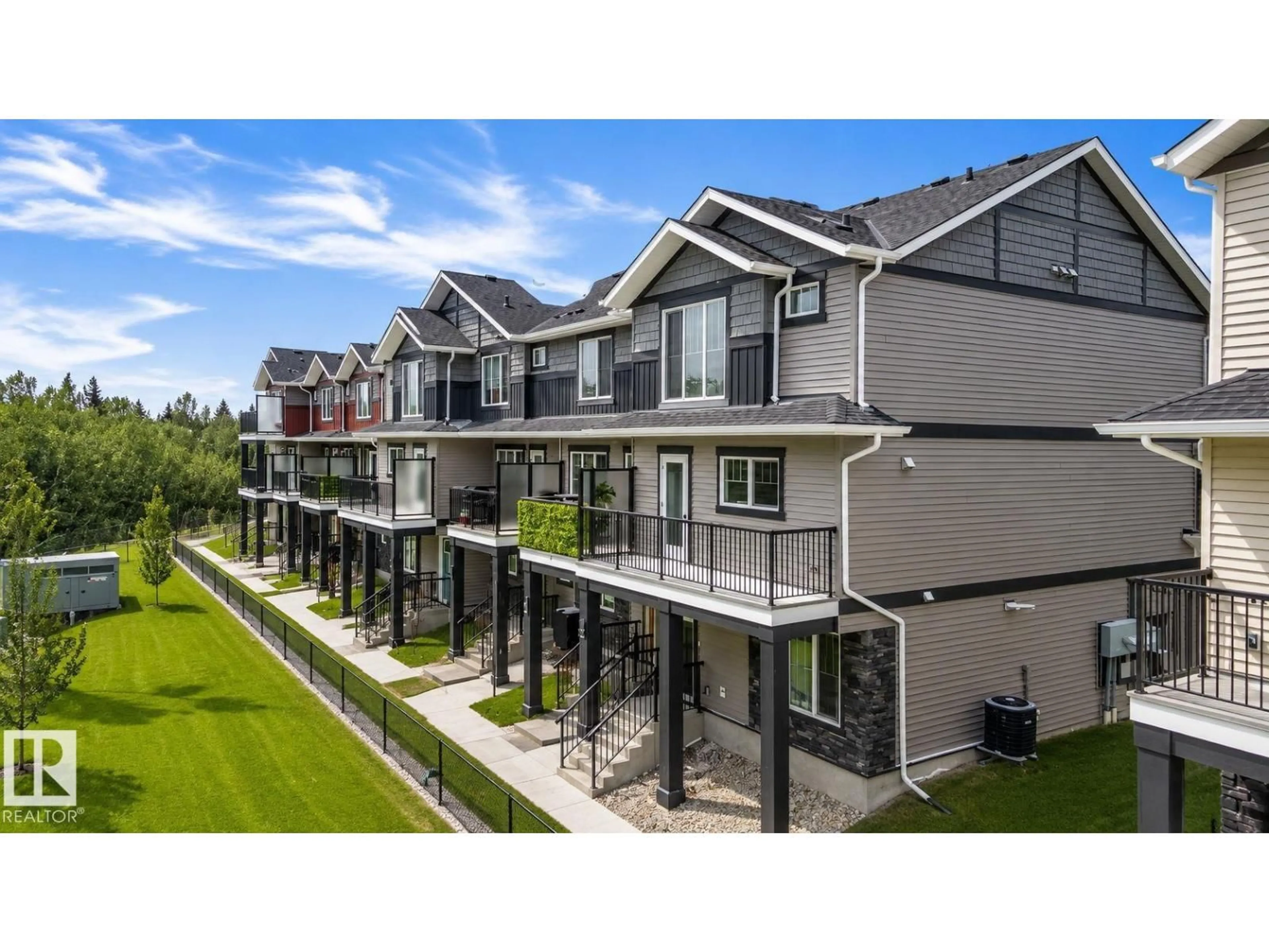 A pic from outside/outdoor area/front of a property/back of a property/a pic from drone, mountain view for #7 - 50 MCLAUGHLIN DR, Spruce Grove Alberta T7X0E1