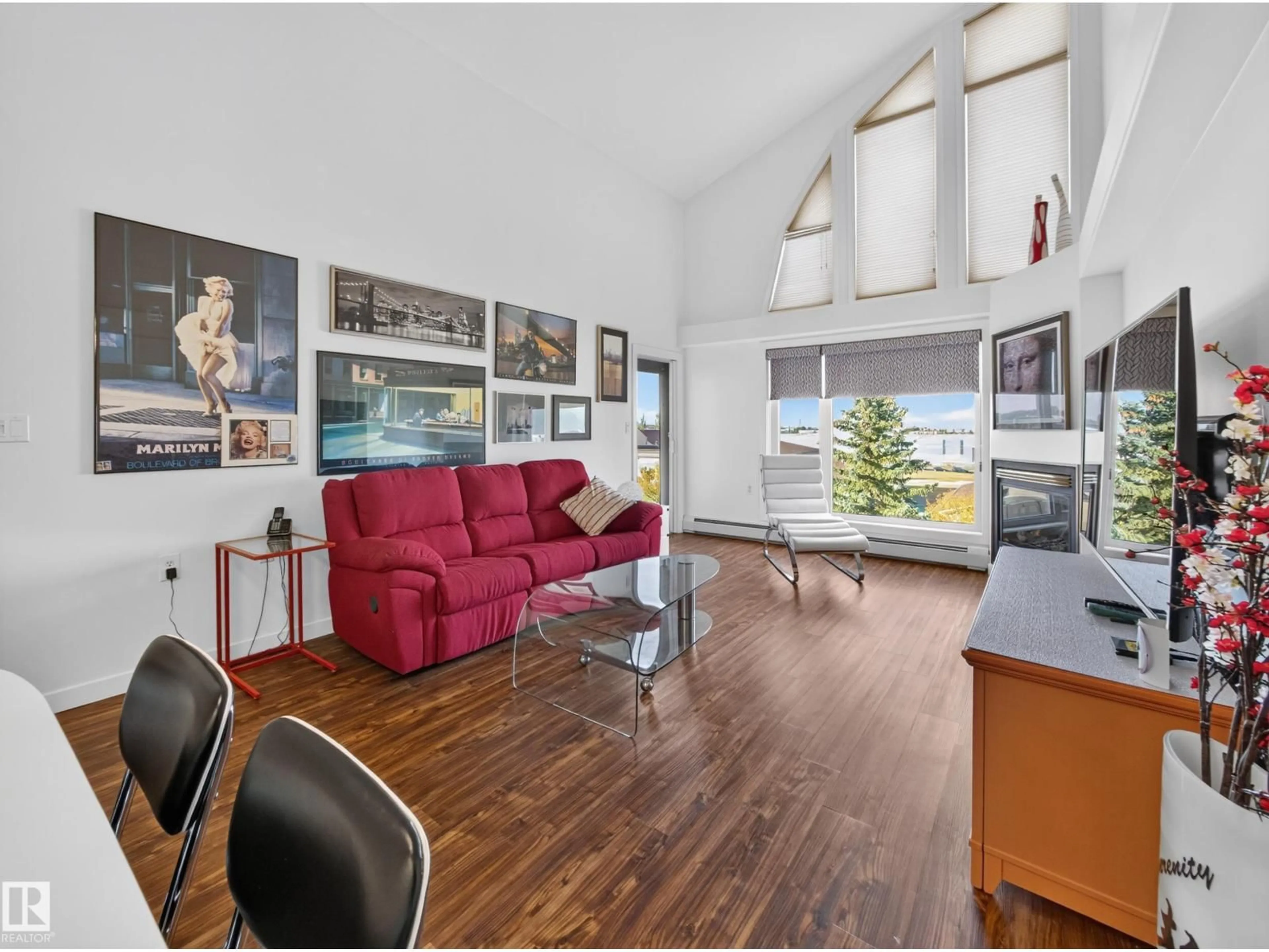 Living room with furniture, wood/laminate floor for #404 - 200 BETHEL DR, Sherwood Park Alberta T8H2C5
