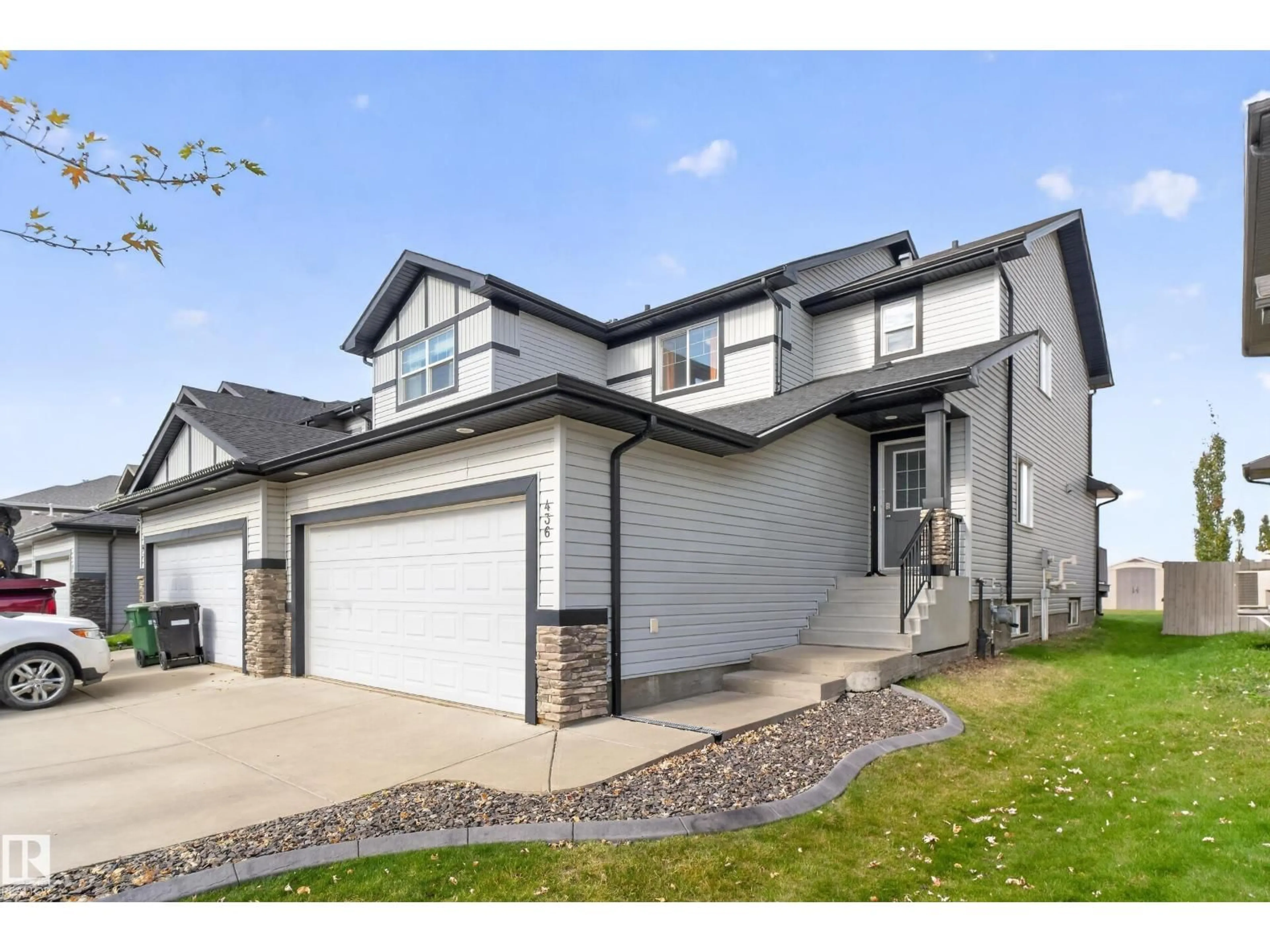 Home with vinyl exterior material, street for 436 REED CR, Leduc Alberta T9E0R5