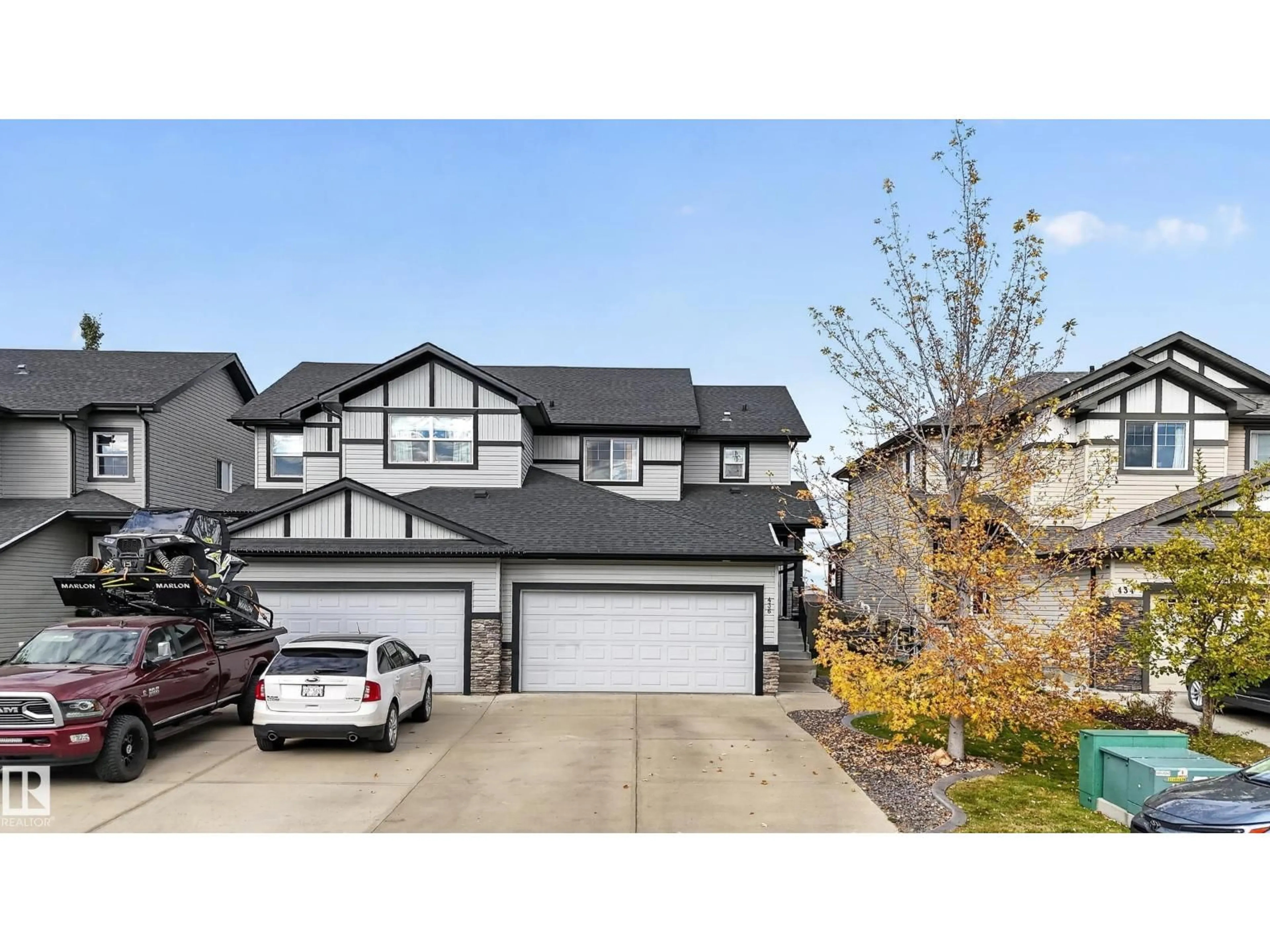 Home with vinyl exterior material, street for 436 REED CR, Leduc Alberta T9E0R5
