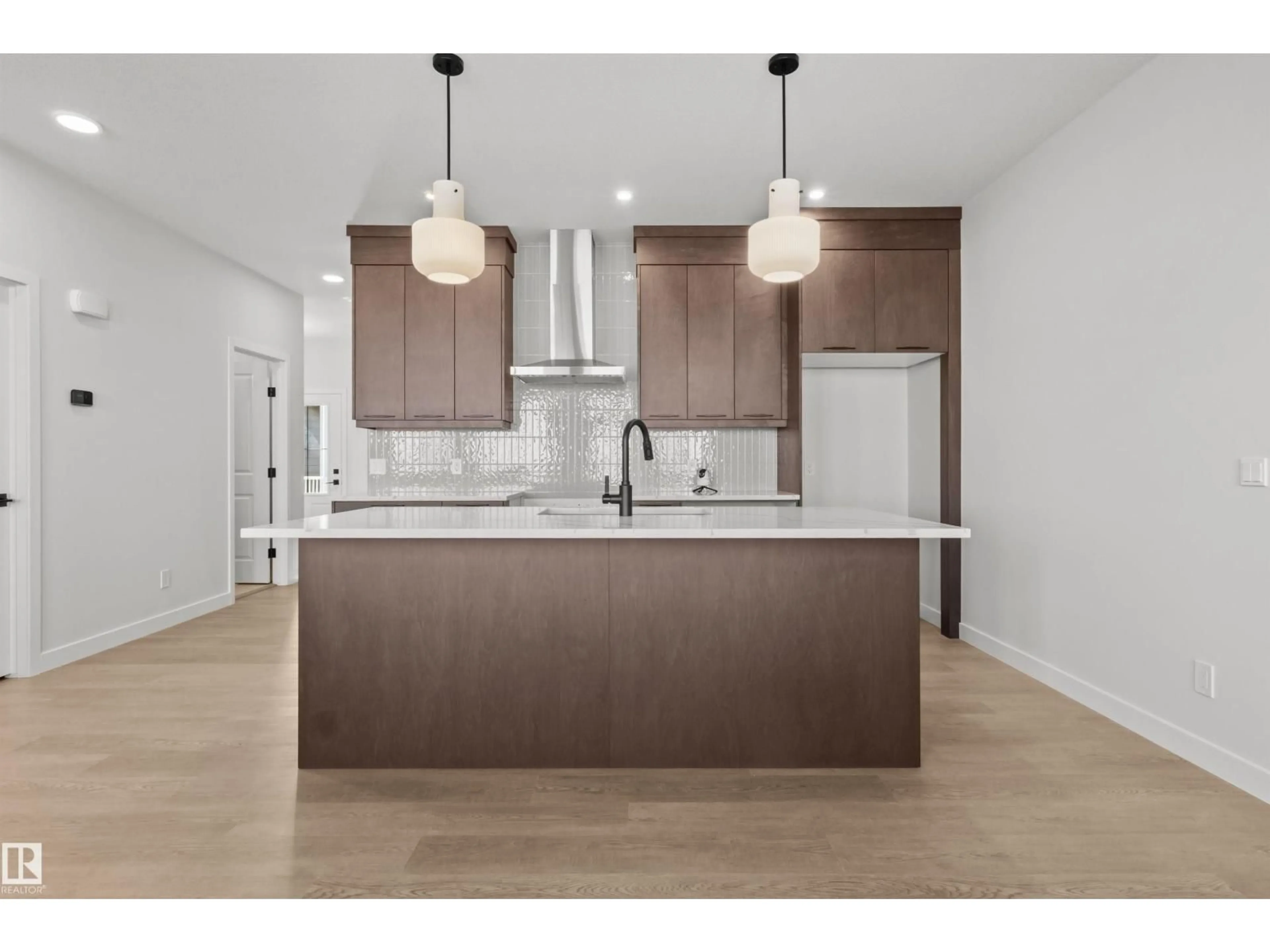Open concept kitchen, wood/laminate floor for SW - 3408 126 ST, Edmonton Alberta T6W5Z8