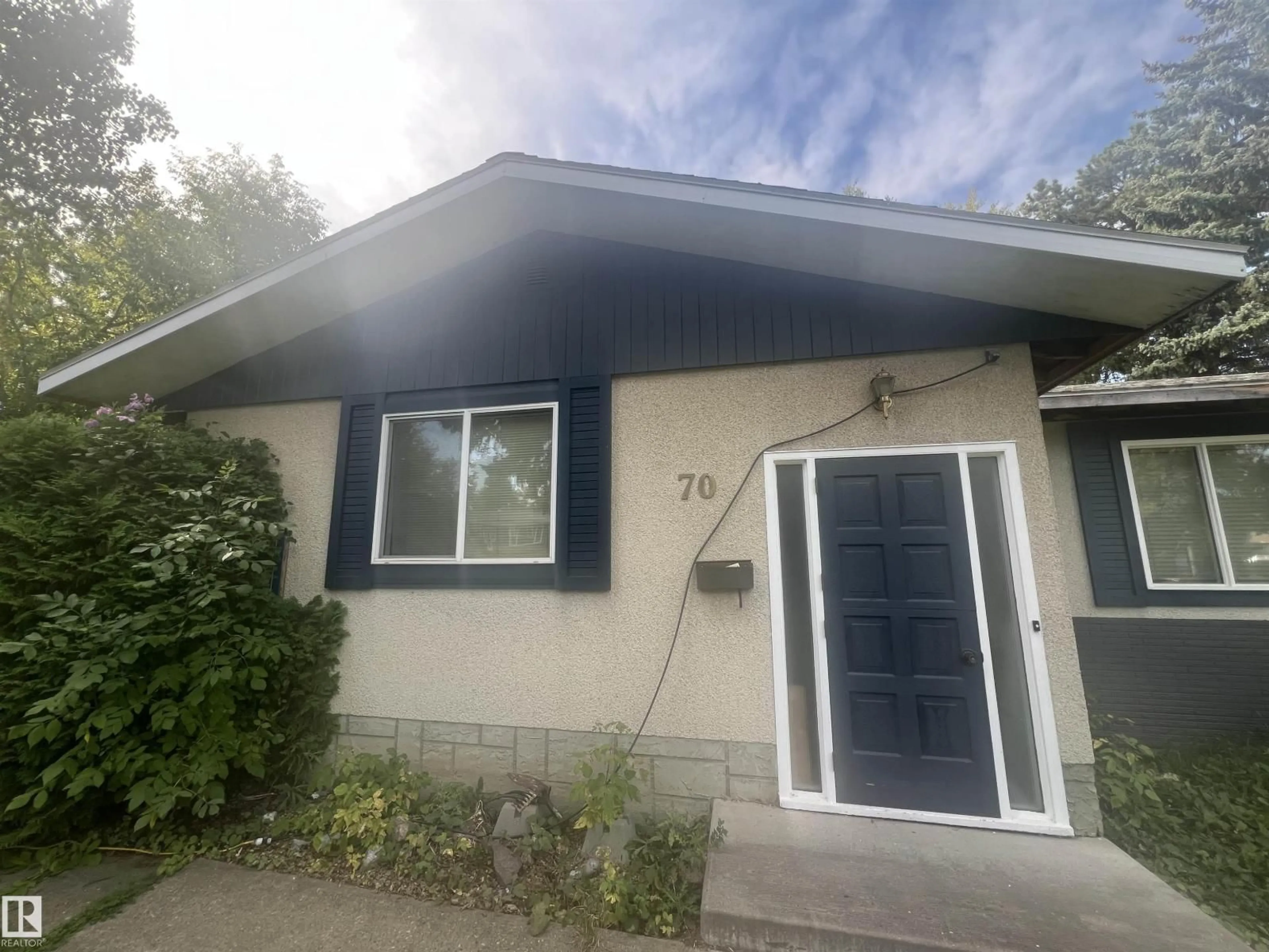 Home with vinyl exterior material, street for 70 SUNSET BV, St. Albert Alberta T8N0N9