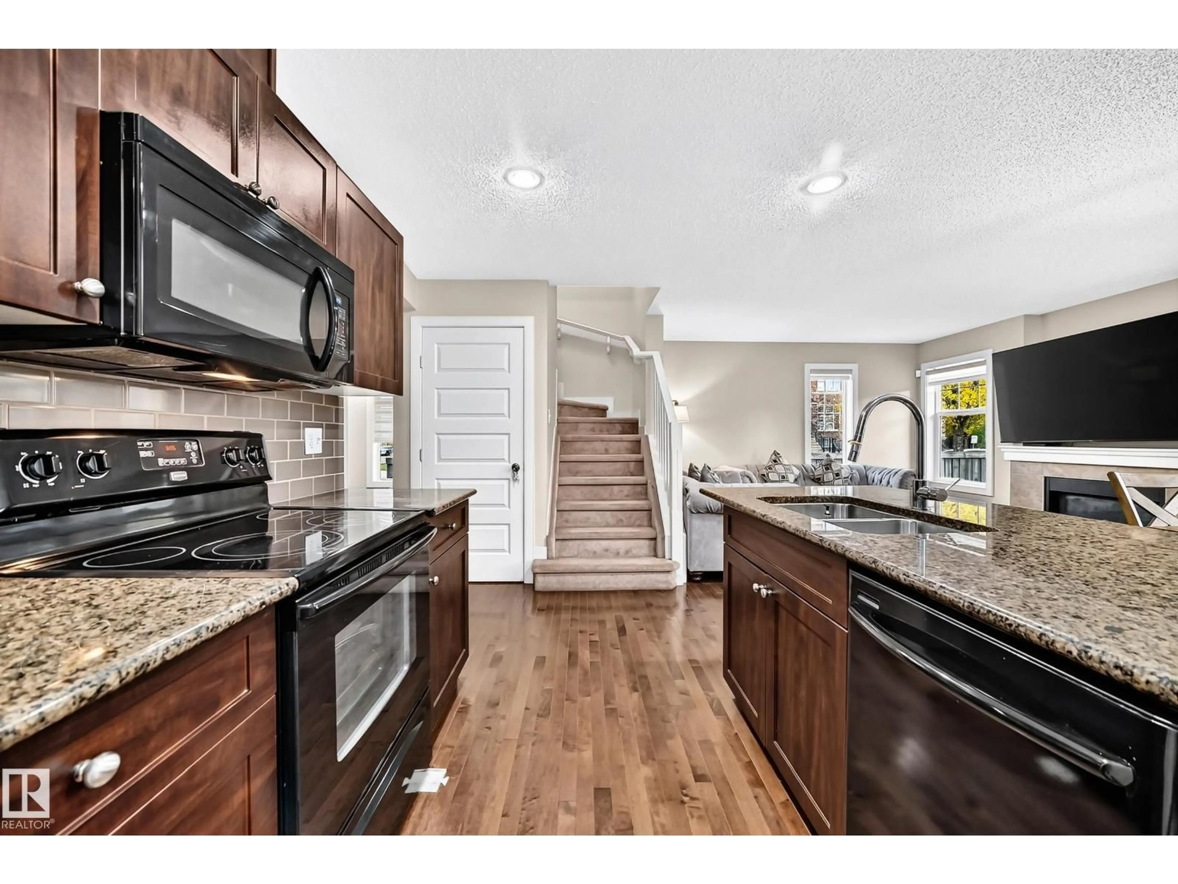 Open concept kitchen, ceramic/tile floor for SW - 1673 CUNNINGHAM WY, Edmonton Alberta T6W0W5