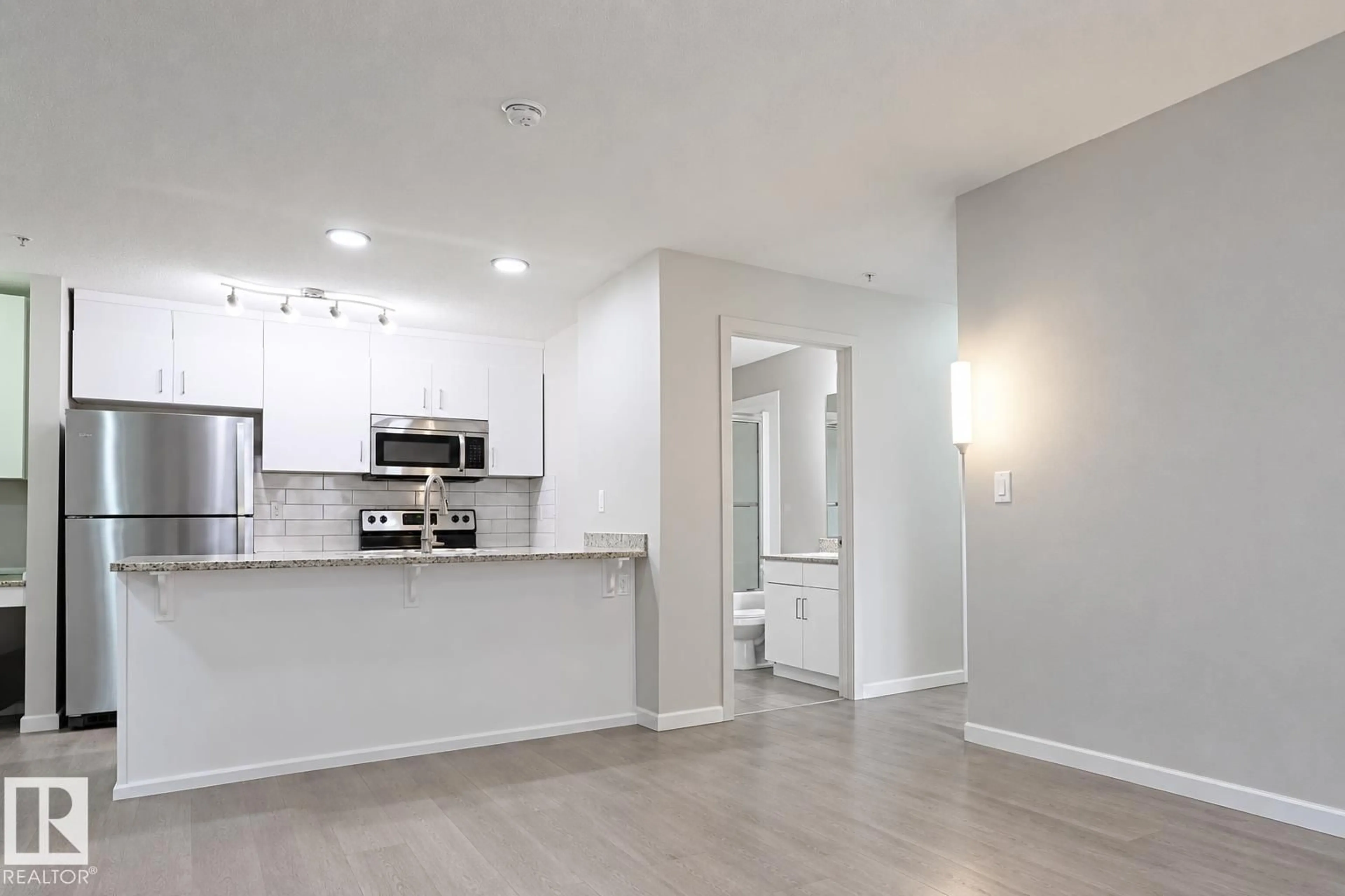 Open concept kitchen, unknown for 127 5515 7 AV, Edmonton Alberta T6X2A8