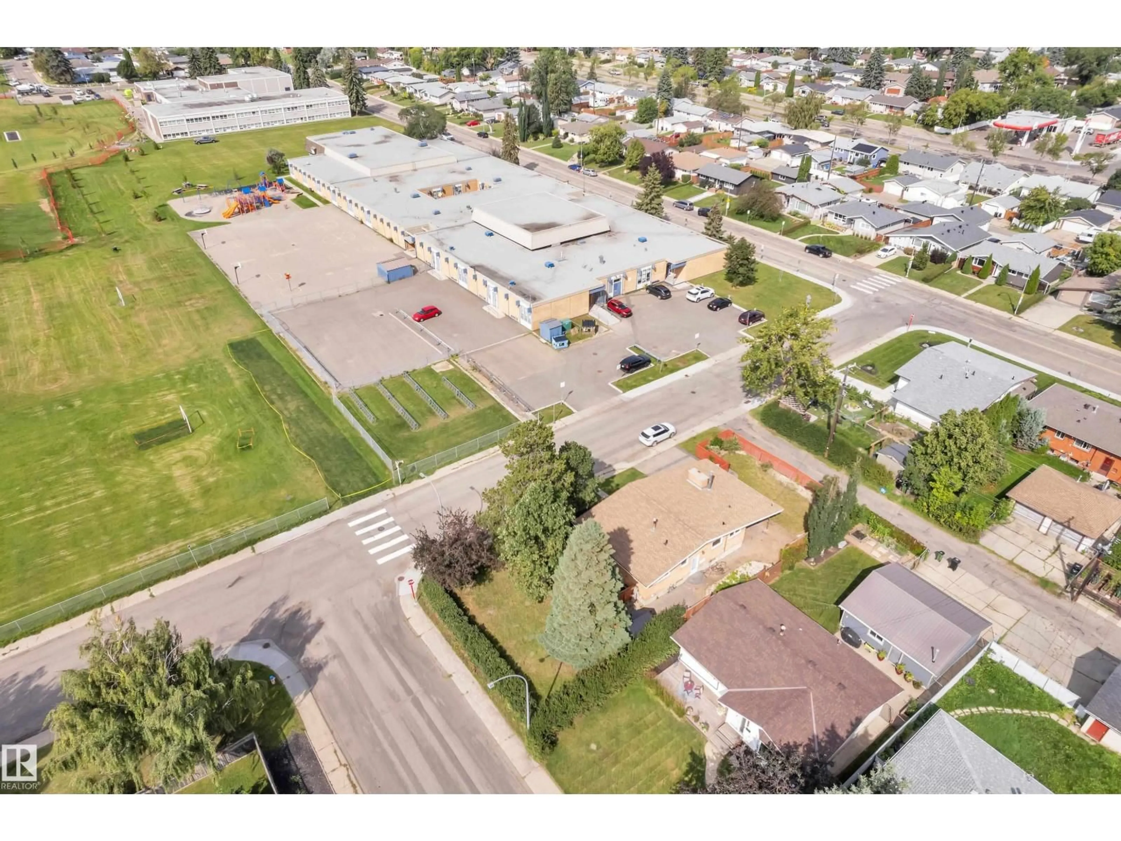 A pic from outside/outdoor area/front of a property/back of a property/a pic from drone, street for NW - 8803 68A ST, Edmonton Alberta T6B1T7