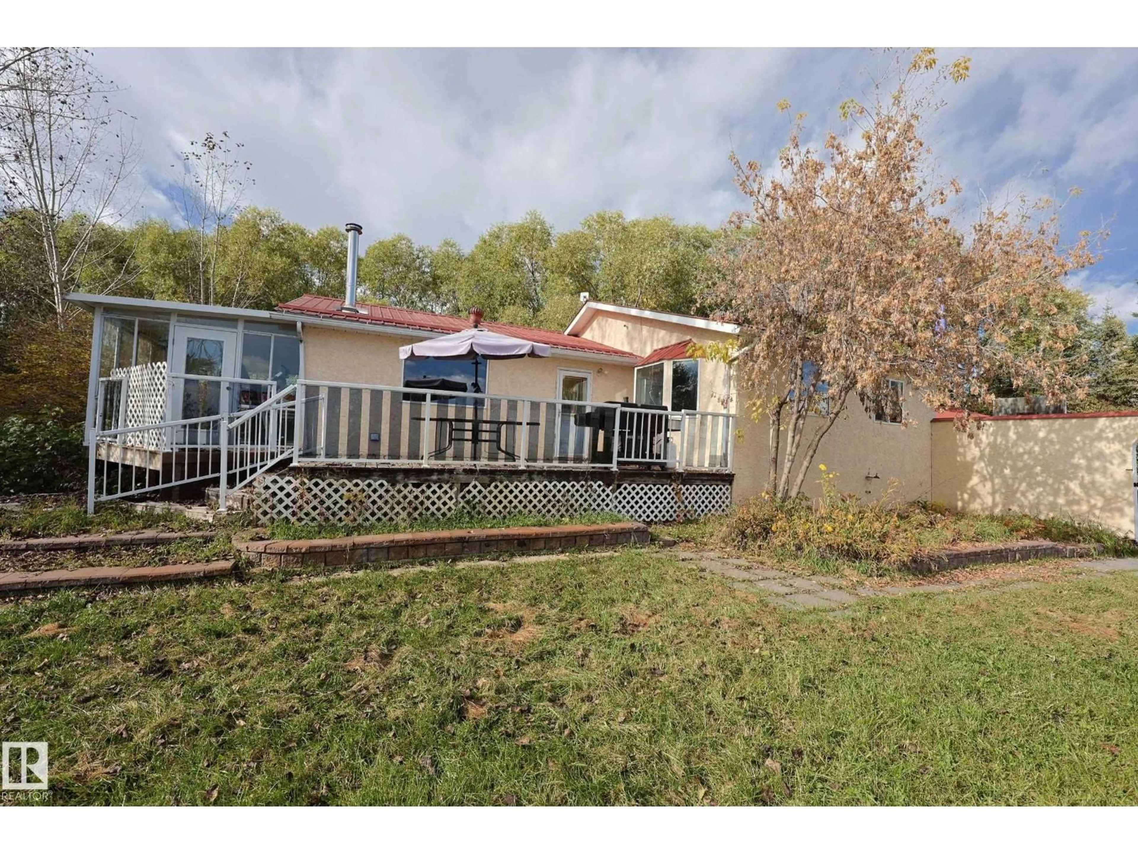 A pic from outside/outdoor area/front of a property/back of a property/a pic from drone, unknown for 3327 STE. ANNE TR, Rural Lac Ste. Anne County Alberta T4B4C6