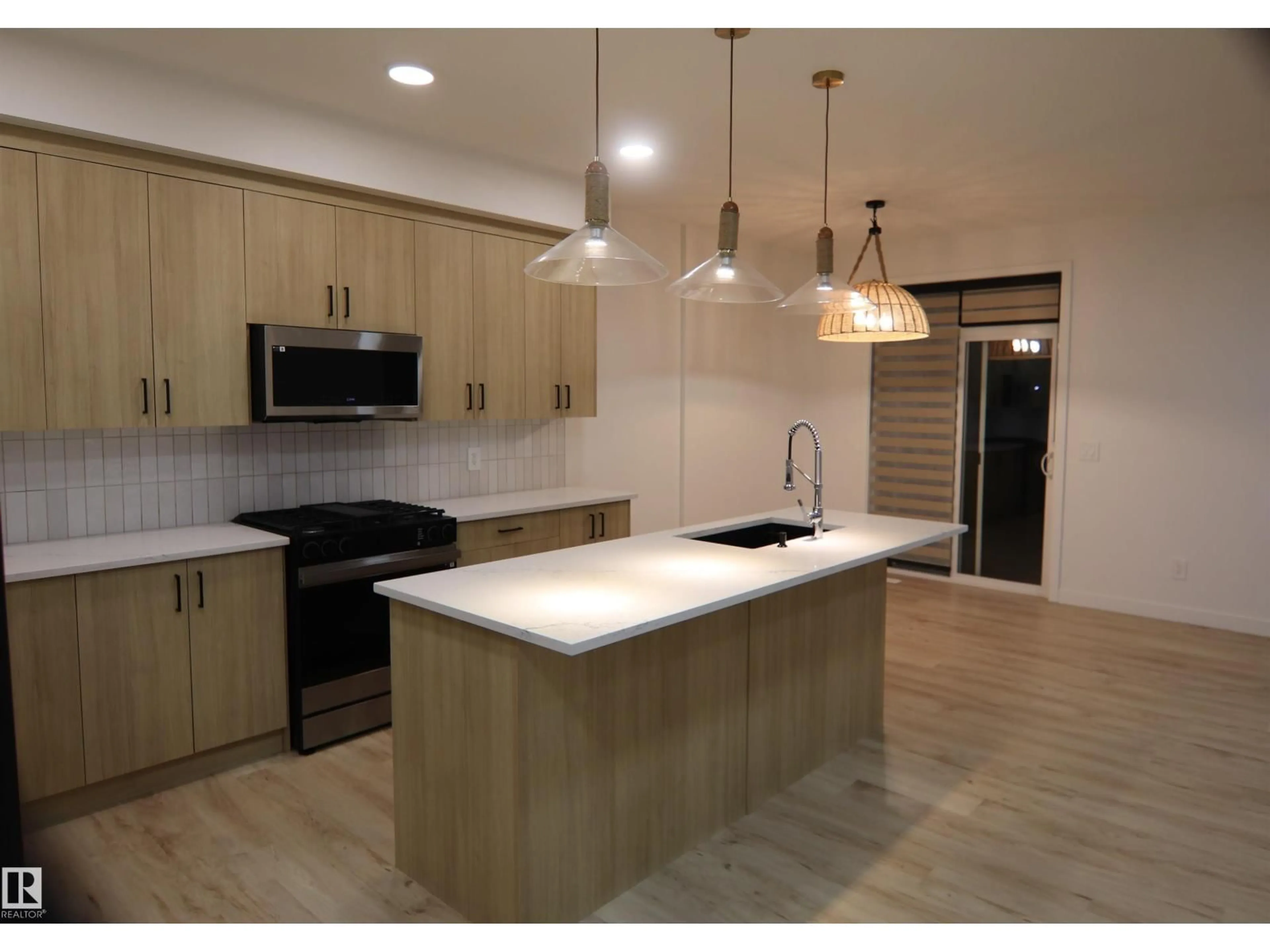 Open concept kitchen, unknown for SW - 3332 168 ST, Edmonton Alberta T6W5M2