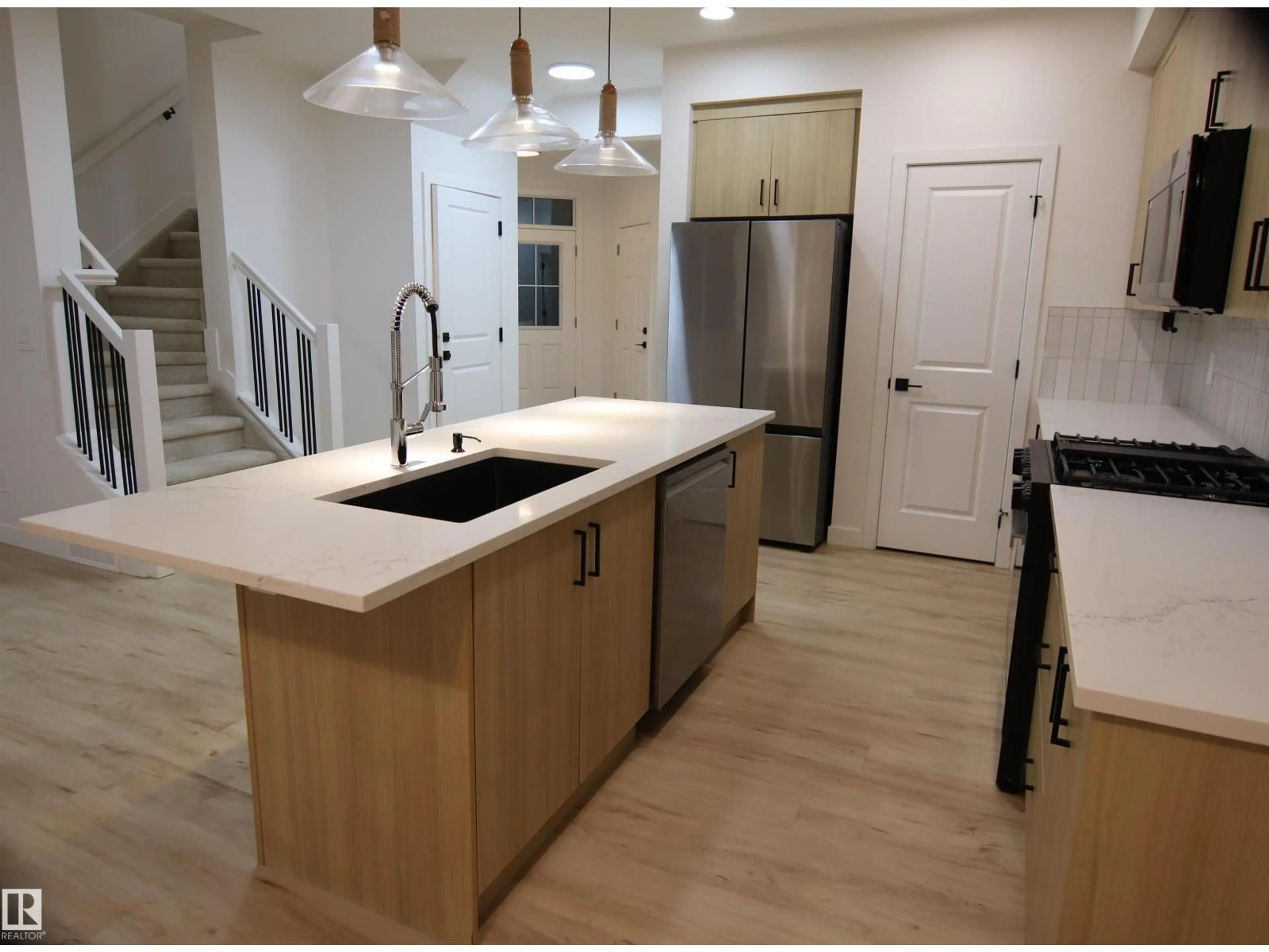 Open concept kitchen, unknown for SW - 3332 168 ST, Edmonton Alberta T6W5M2